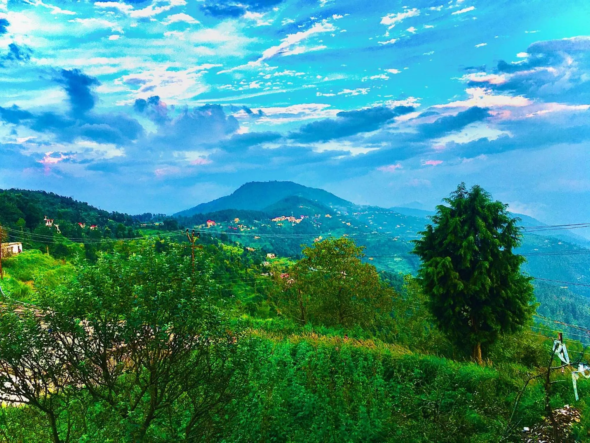 Natural landscape in LA Riqueza Kanatal - Mountain View Rooms - Best Location - Amazing Food - Close to Jungle Safari & Adventure Activities