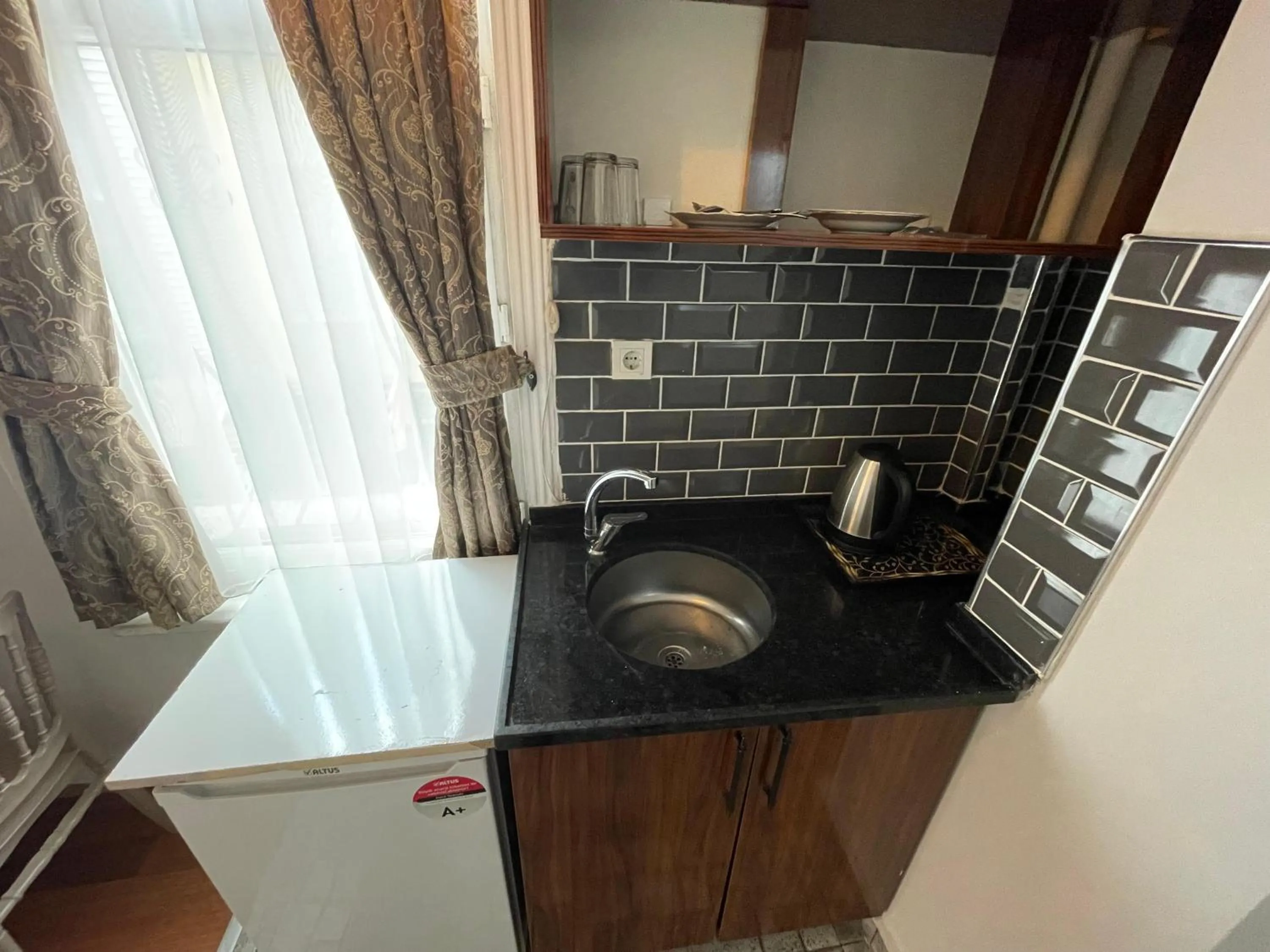 Kitchen or kitchenette in Grey House Apartments & Suites Istanbul