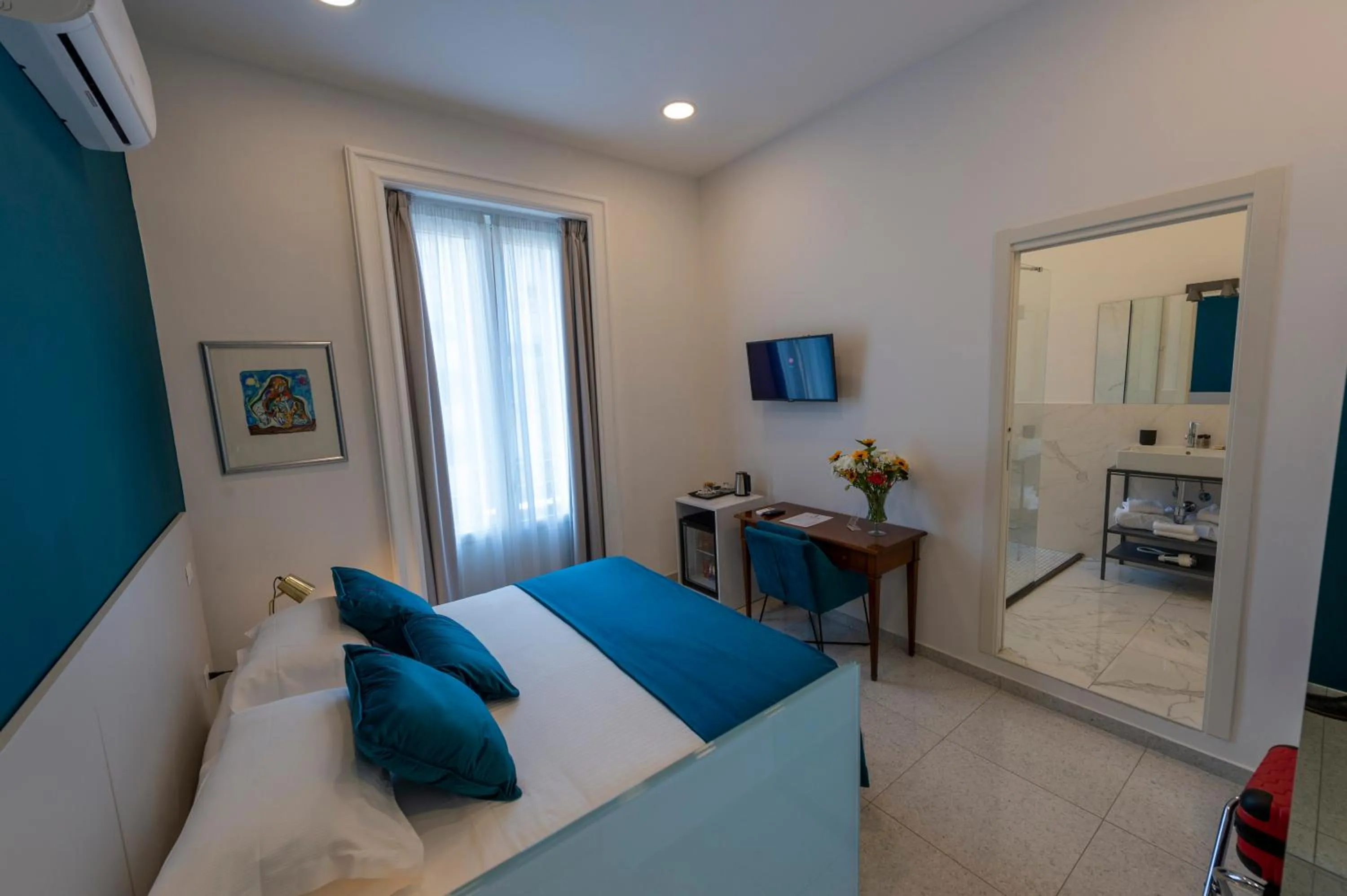 Bed in Le Angioine Rooms