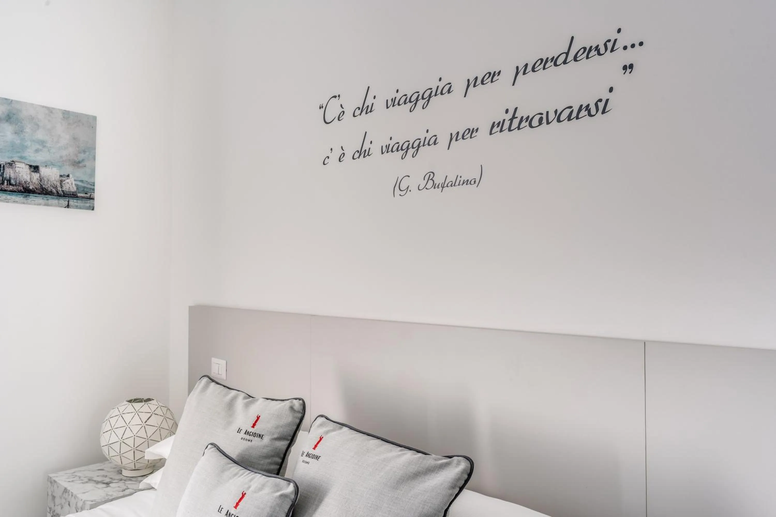 Bed in Le Angioine Rooms