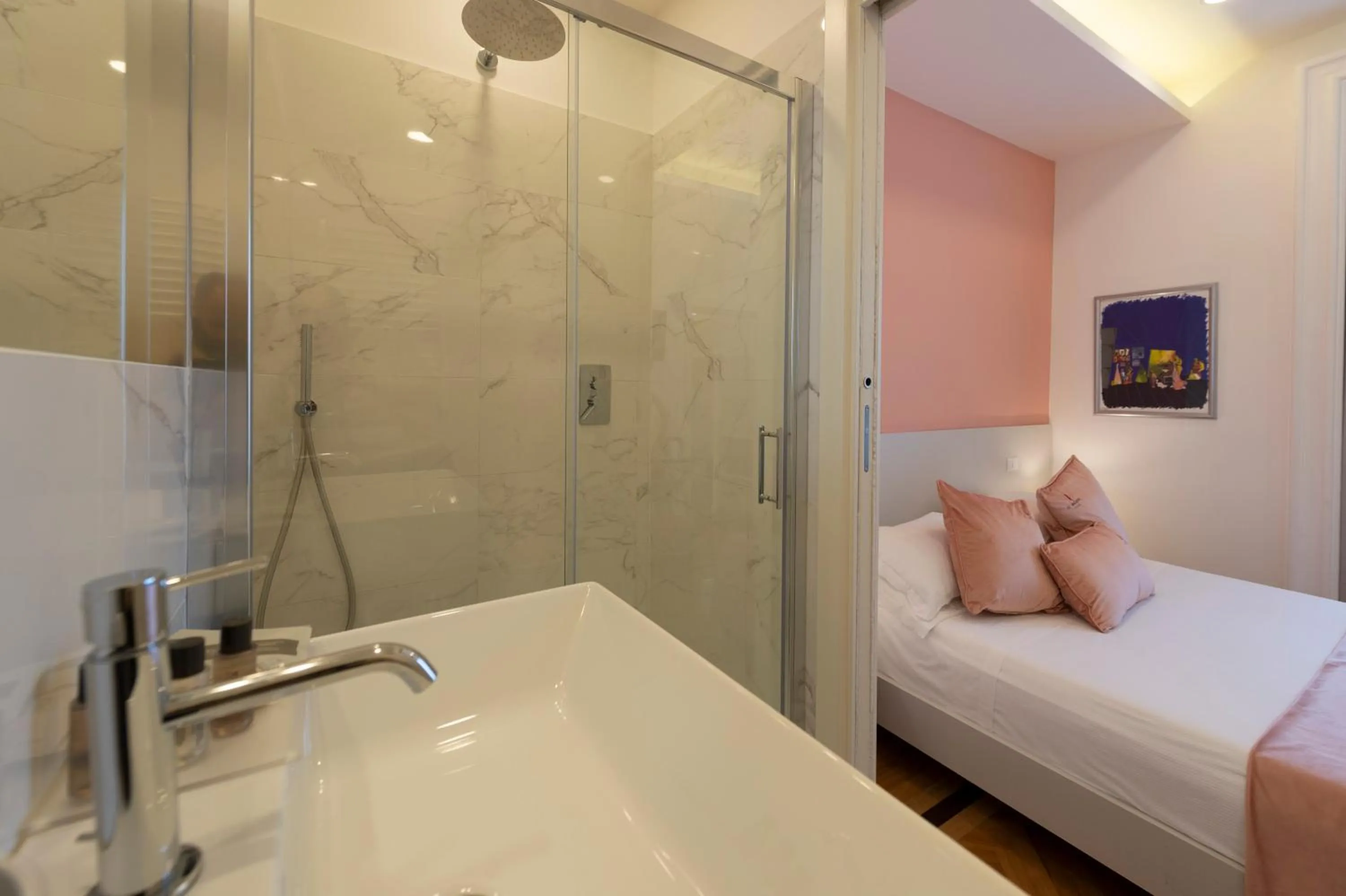 Bed in Le Angioine Rooms