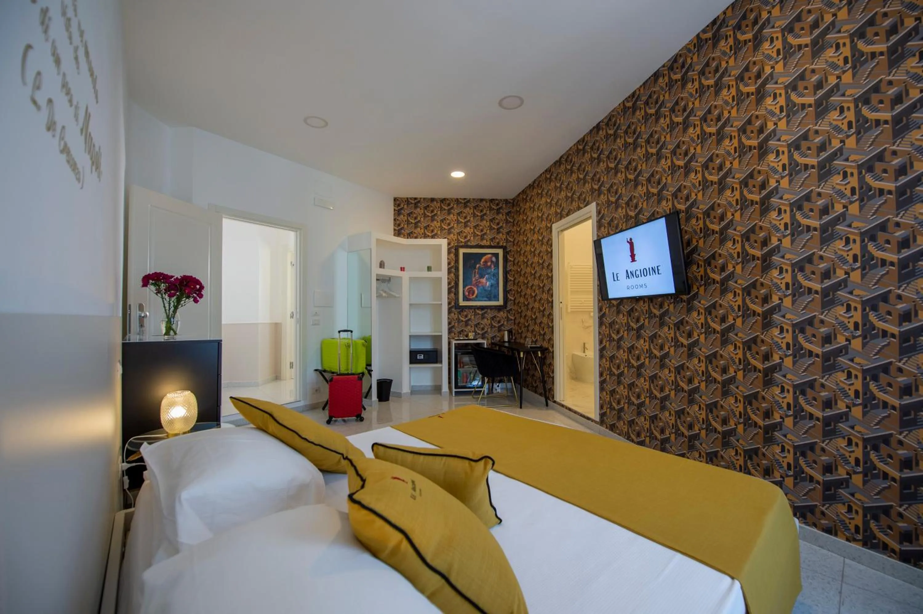 Bed in Le Angioine Rooms