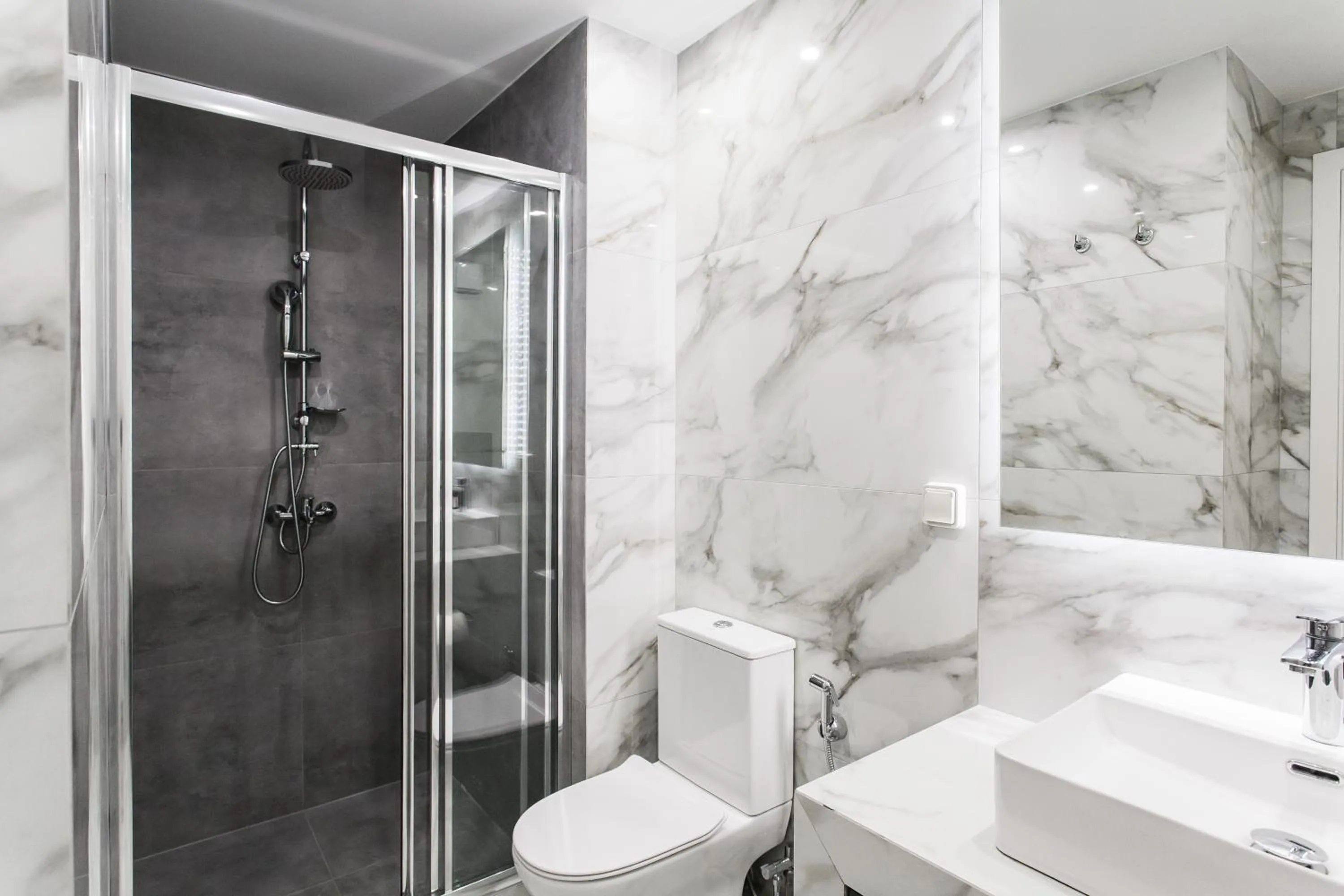 Shower in WYZ Athens Apartments by UPSTREET