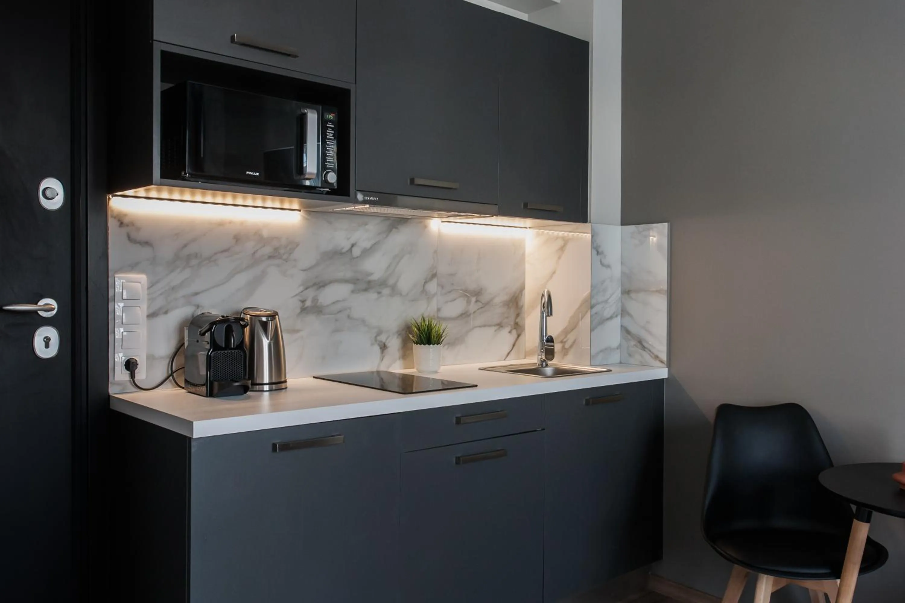 Coffee/tea facilities in WYZ Athens Apartments by UPSTREET