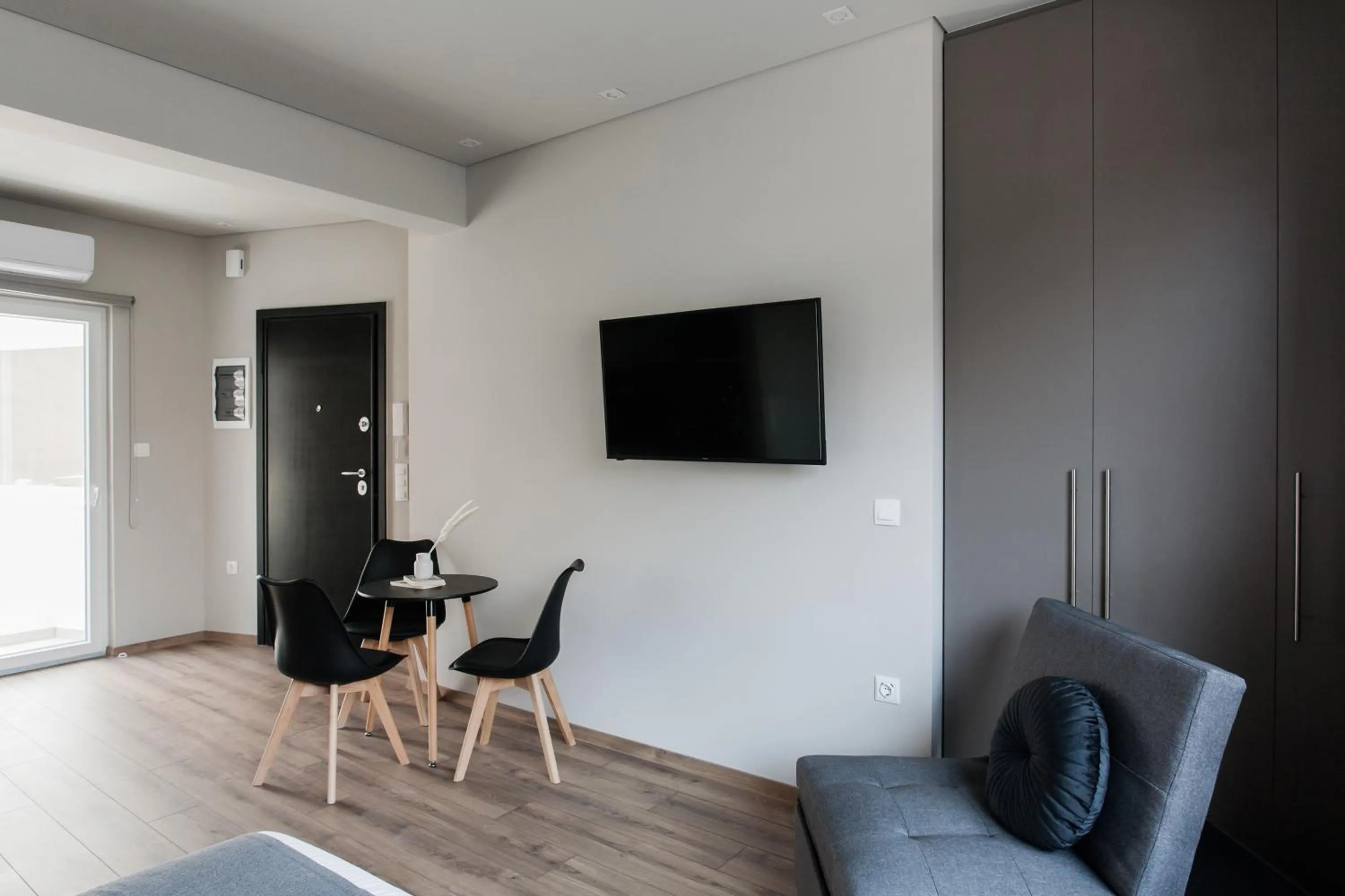 TV and multimedia in WYZ Athens Apartments by UPSTREET