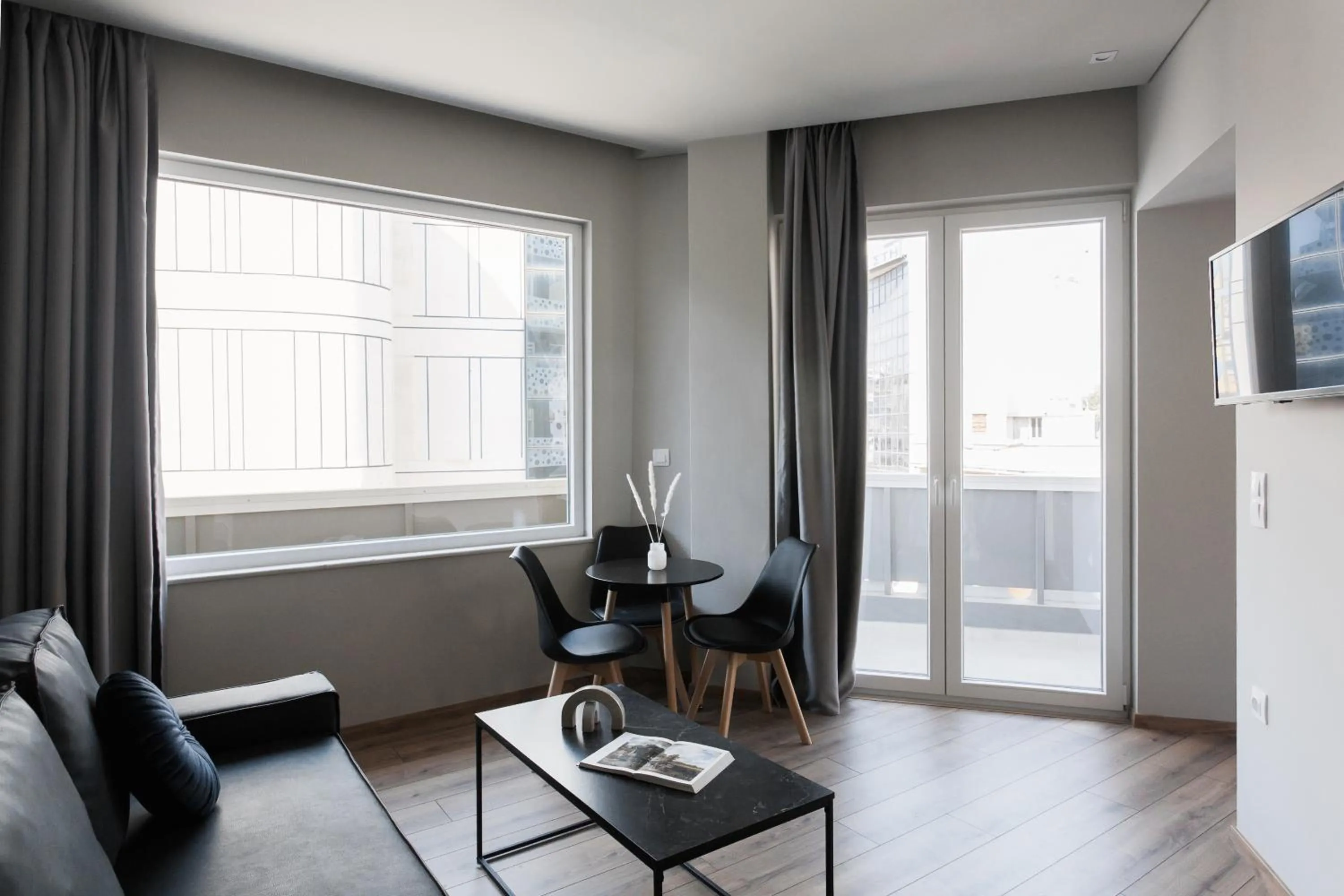 Living room in WYZ Athens Apartments by UPSTREET