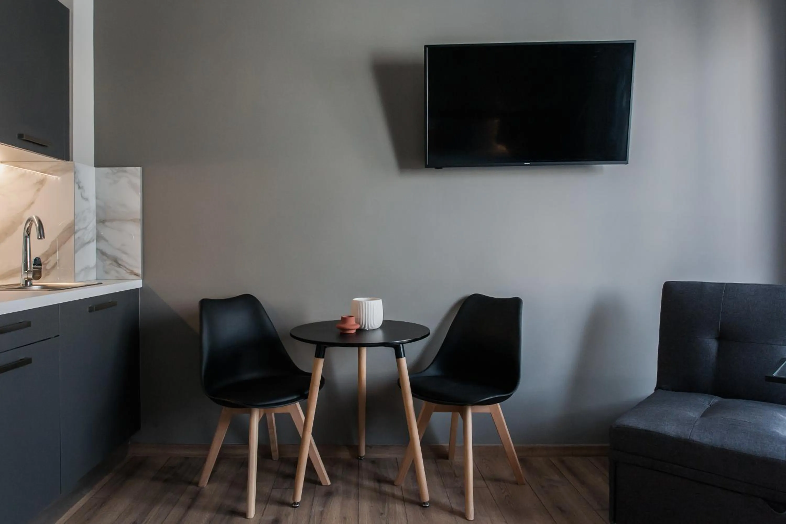 Living room in WYZ Athens Apartments by UPSTREET