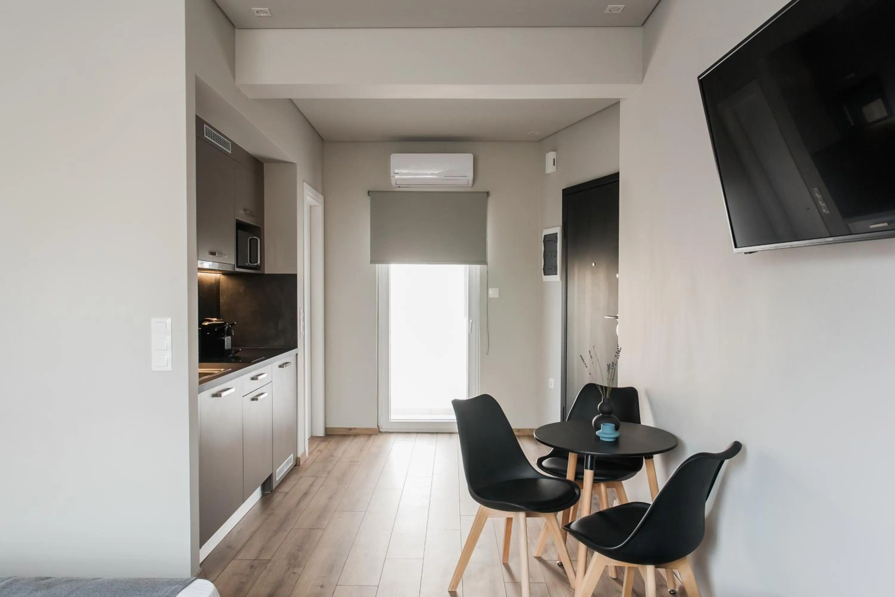 TV and multimedia in WYZ Athens Apartments by UPSTREET