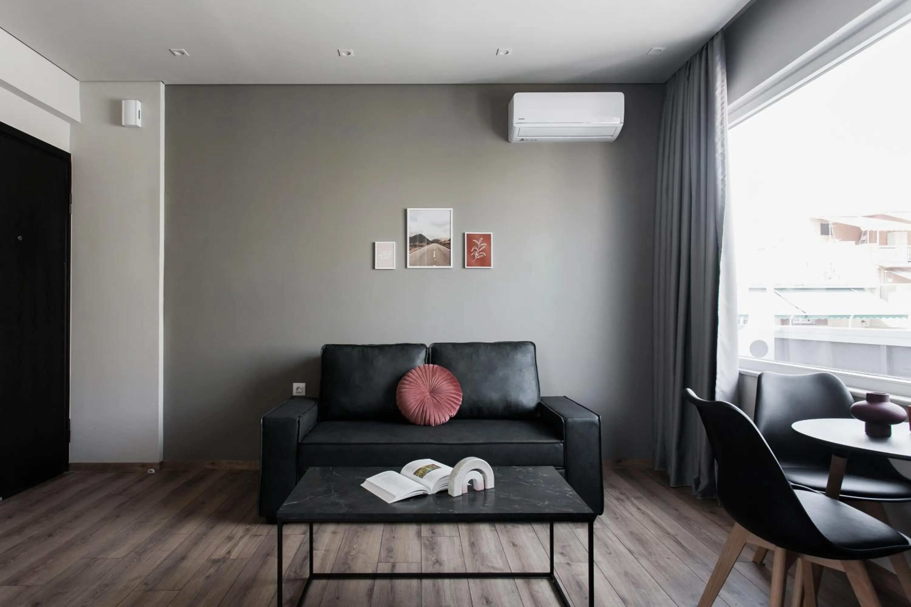 Living room in WYZ Athens Apartments by UPSTREET