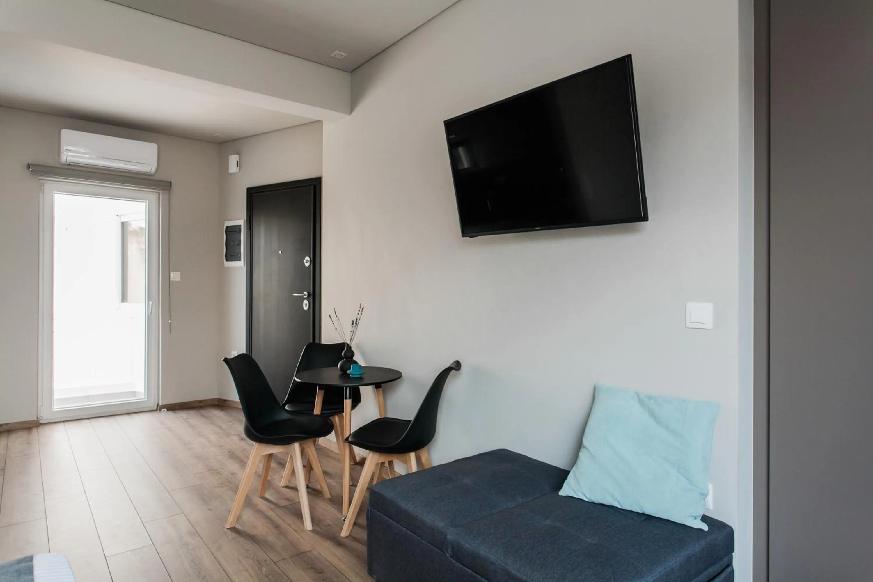 TV and multimedia in WYZ Athens Apartments by UPSTREET