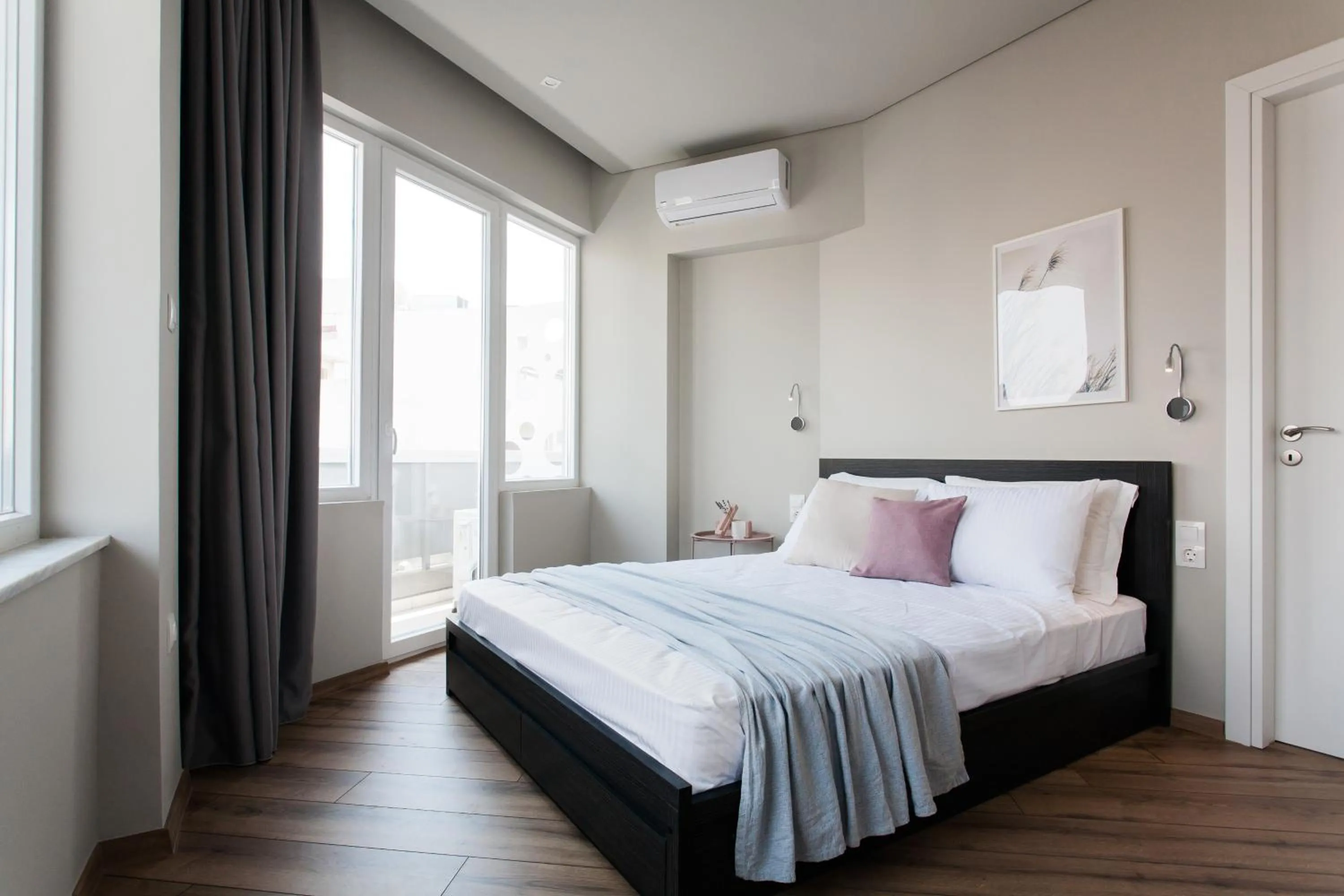 Bed in WYZ Athens Apartments by UPSTREET