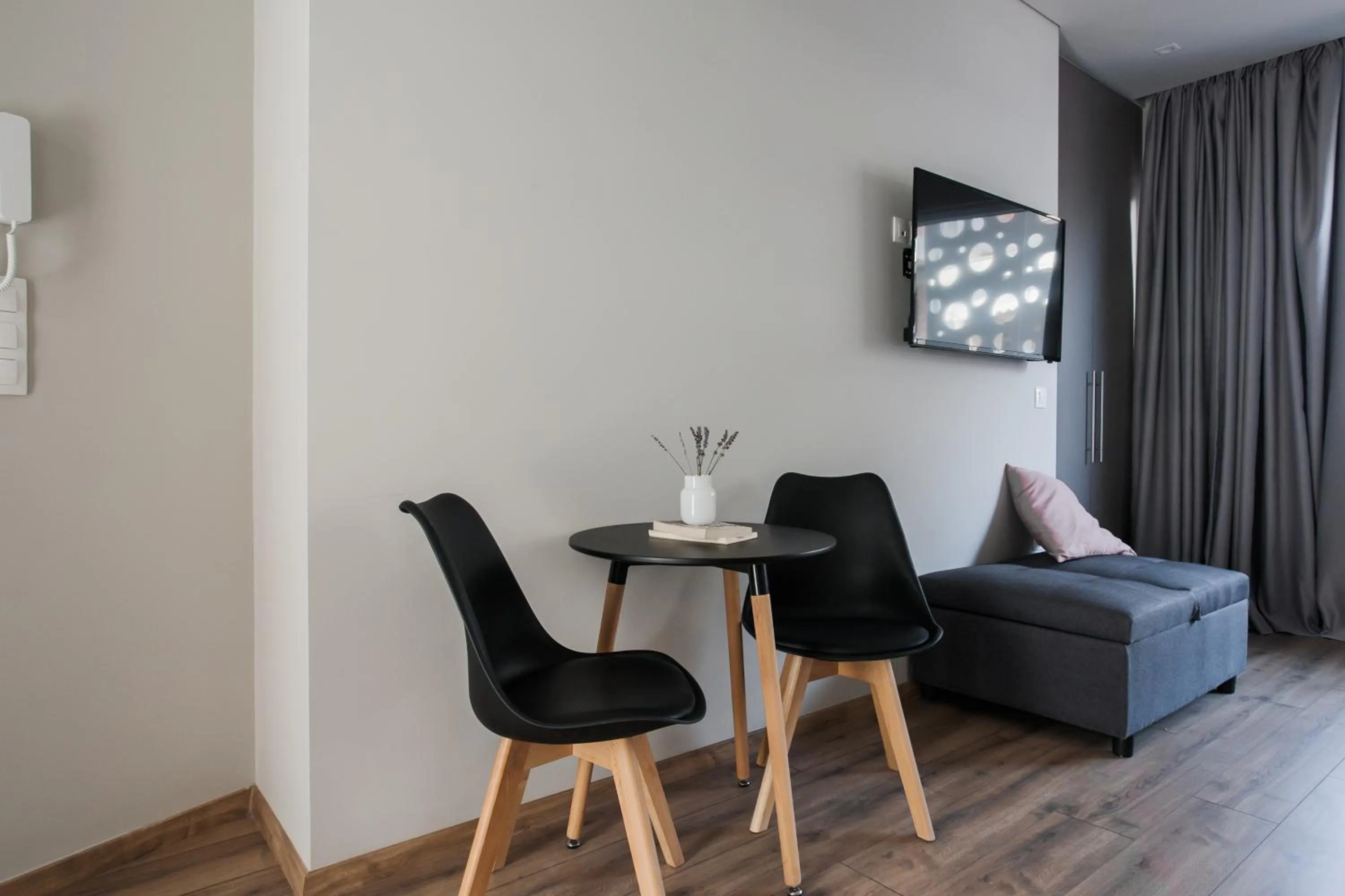TV and multimedia in WYZ Athens Apartments by UPSTREET