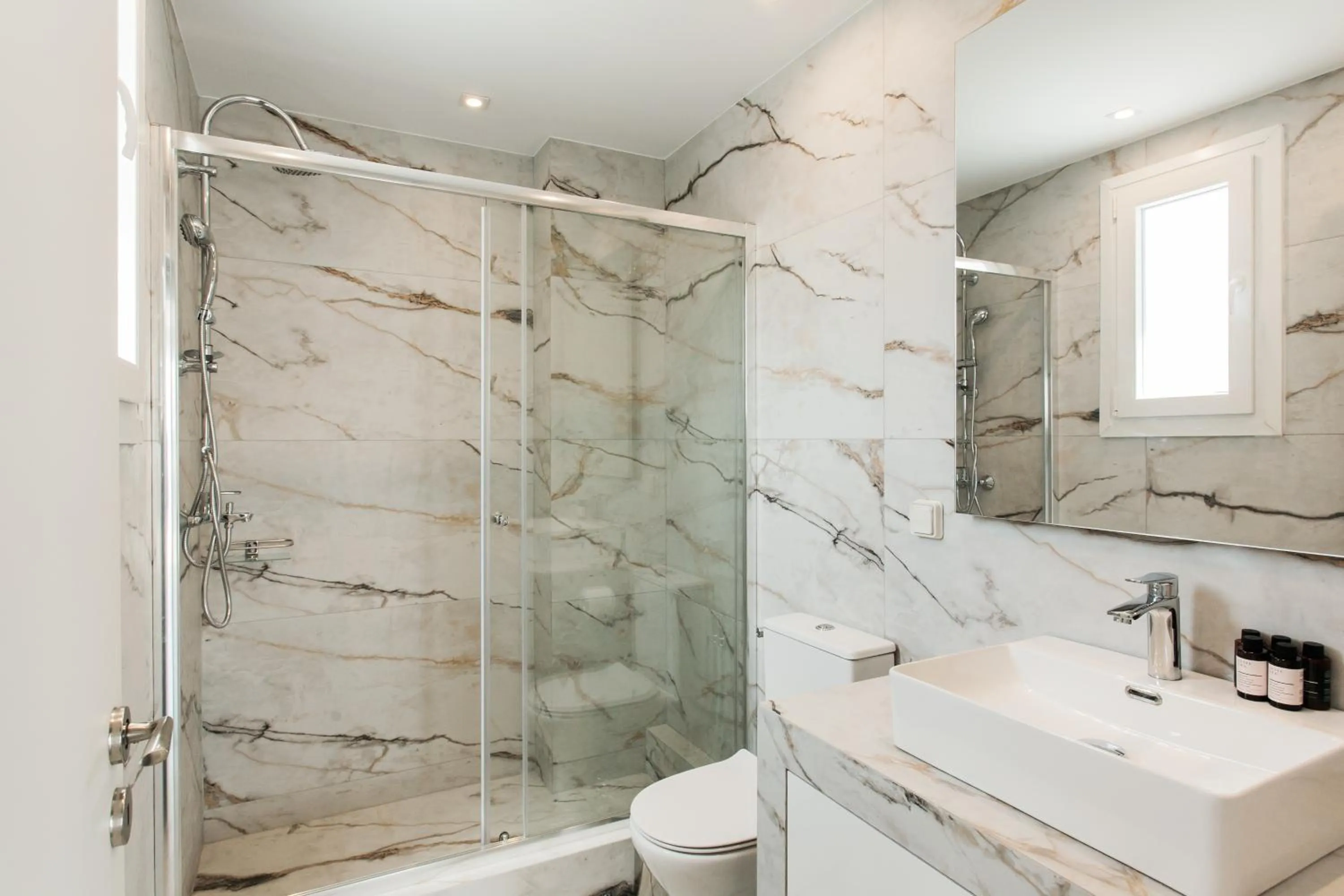 Shower in WYZ Athens Apartments by UPSTREET