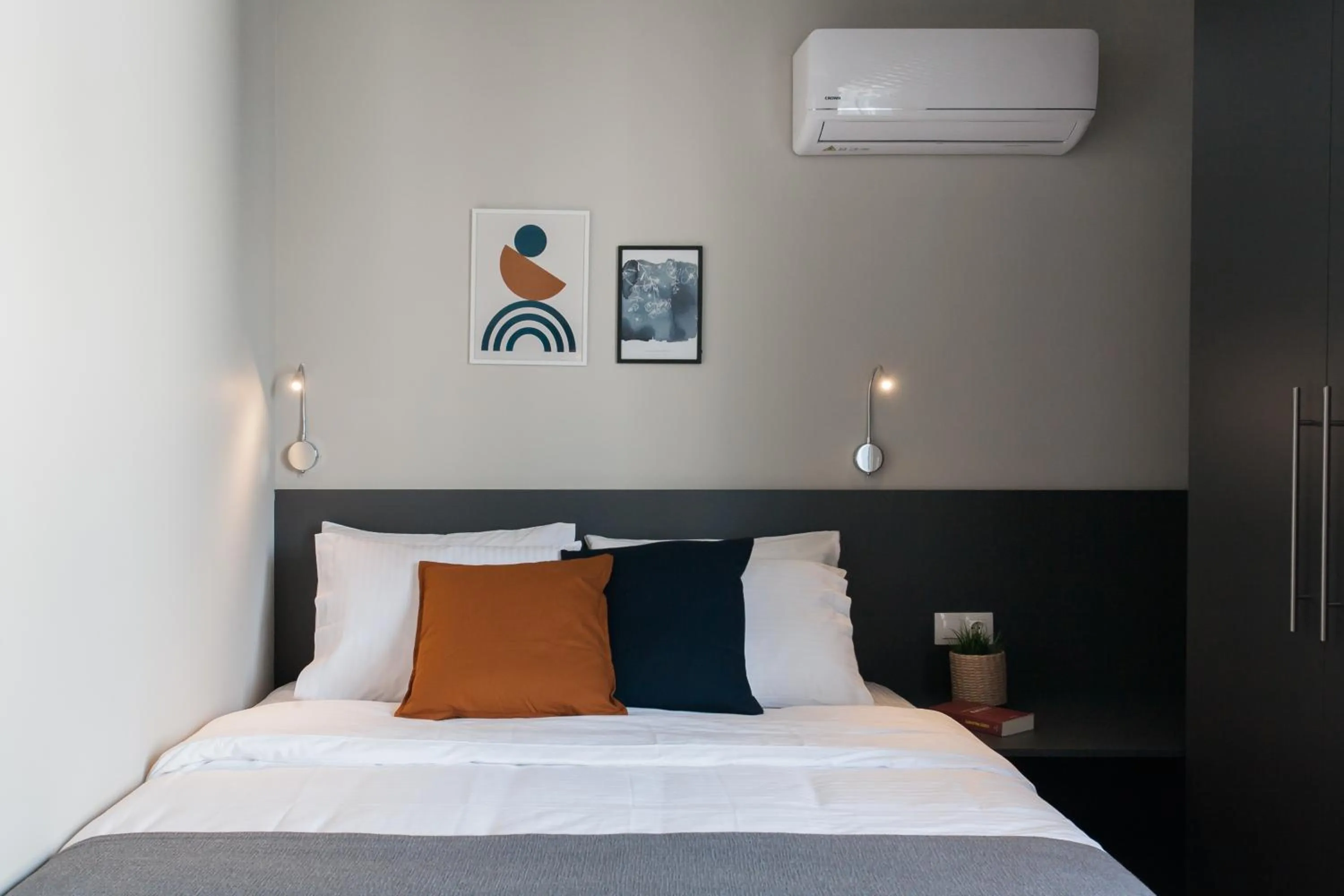 Bed in WYZ Athens Apartments by UPSTREET