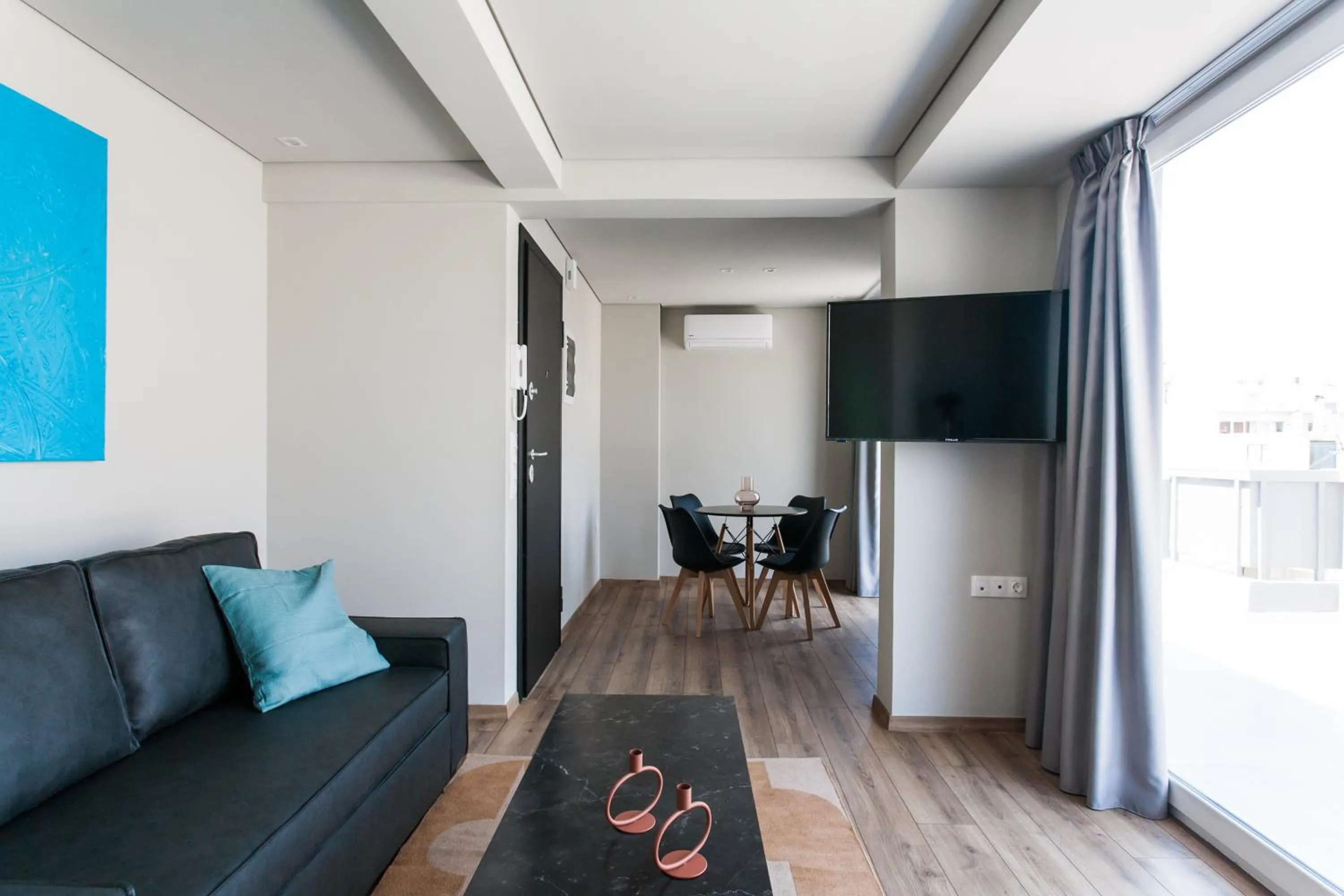 TV and multimedia in WYZ Athens Apartments by UPSTREET