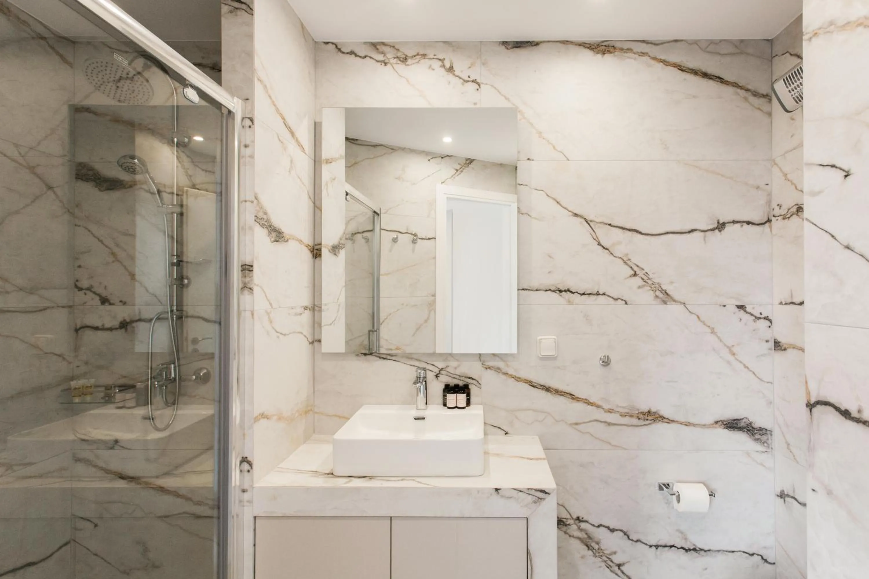 Shower in WYZ Athens Apartments by UPSTREET