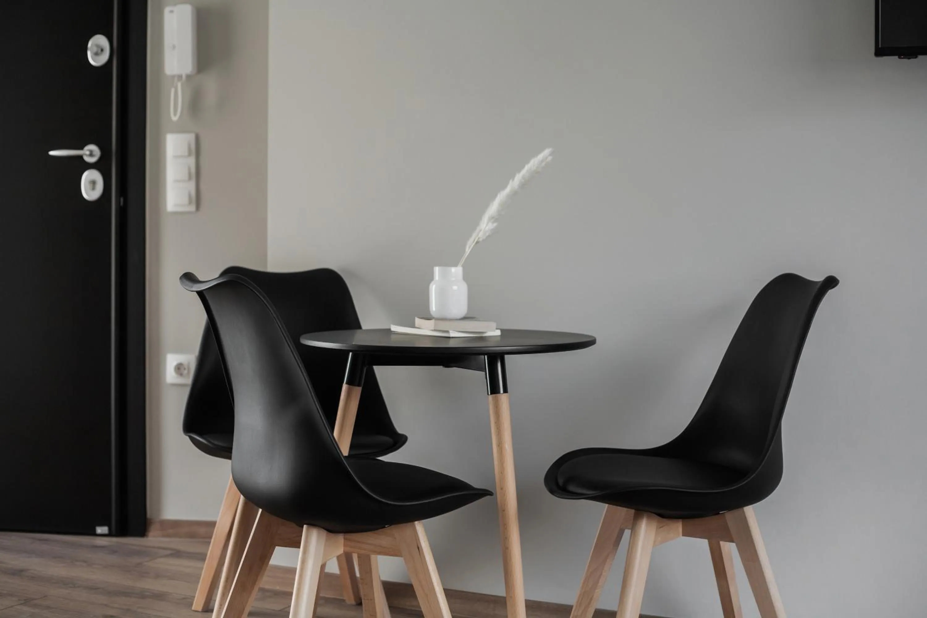 Dining area in WYZ Athens Apartments by UPSTREET