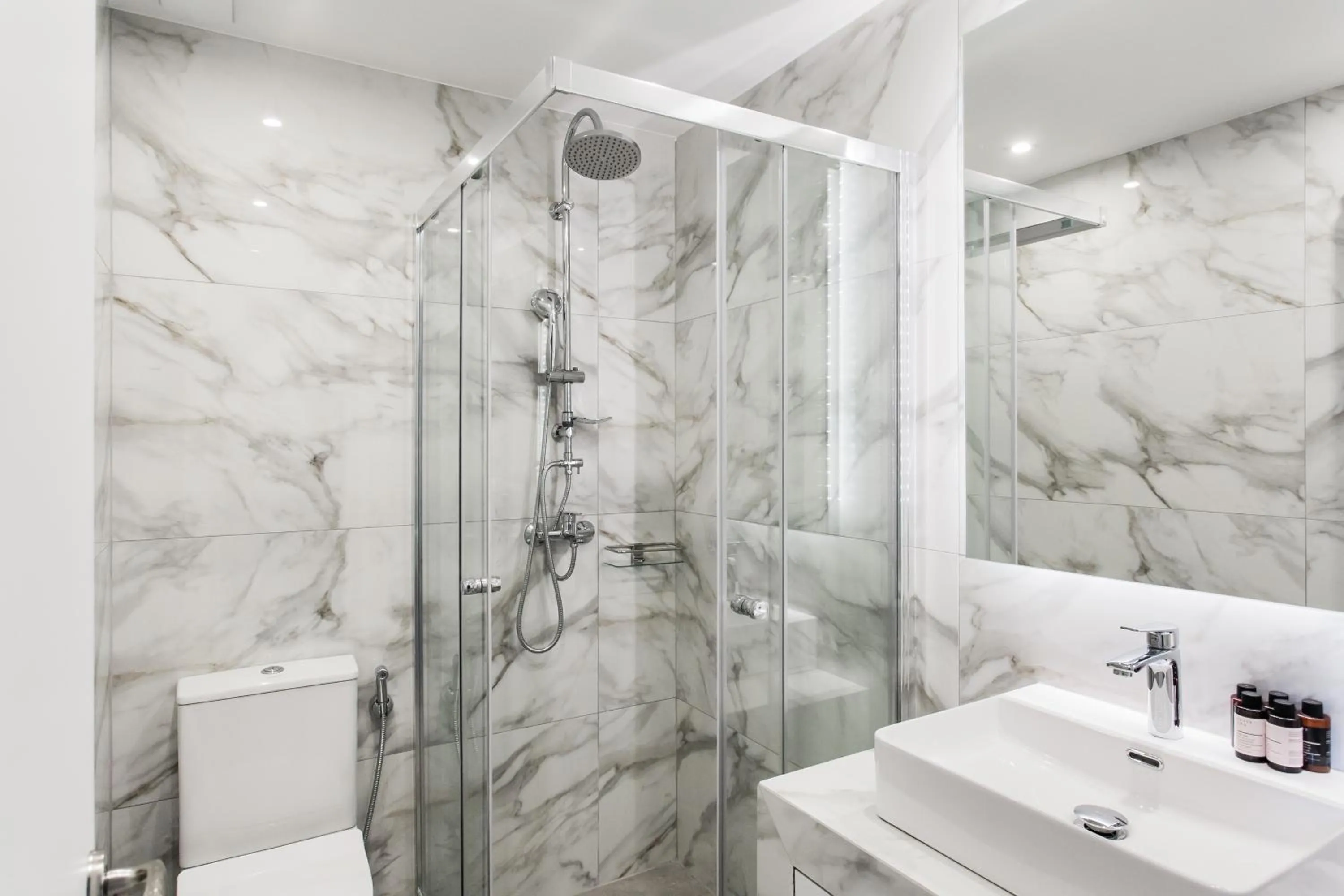 Shower in WYZ Athens Apartments by UPSTREET