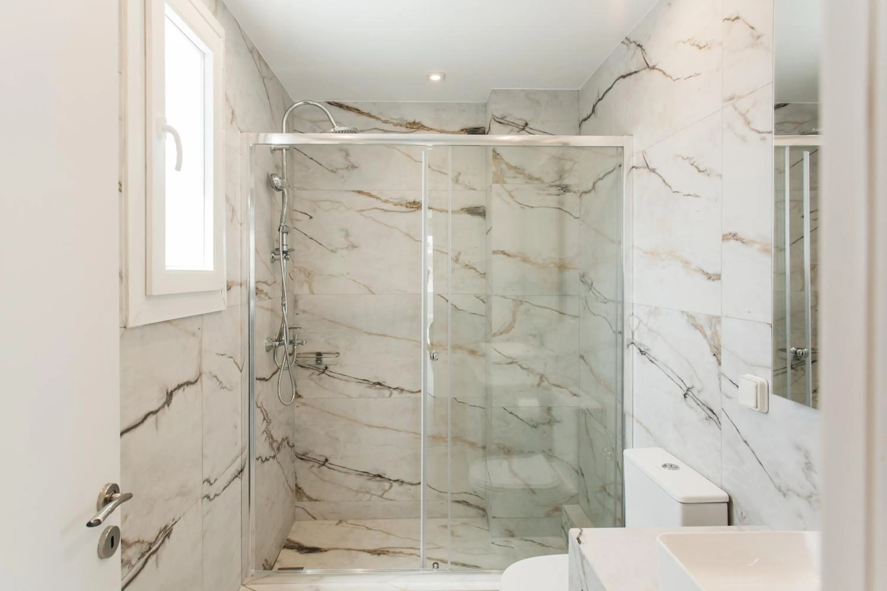 Shower in WYZ Athens Apartments by UPSTREET