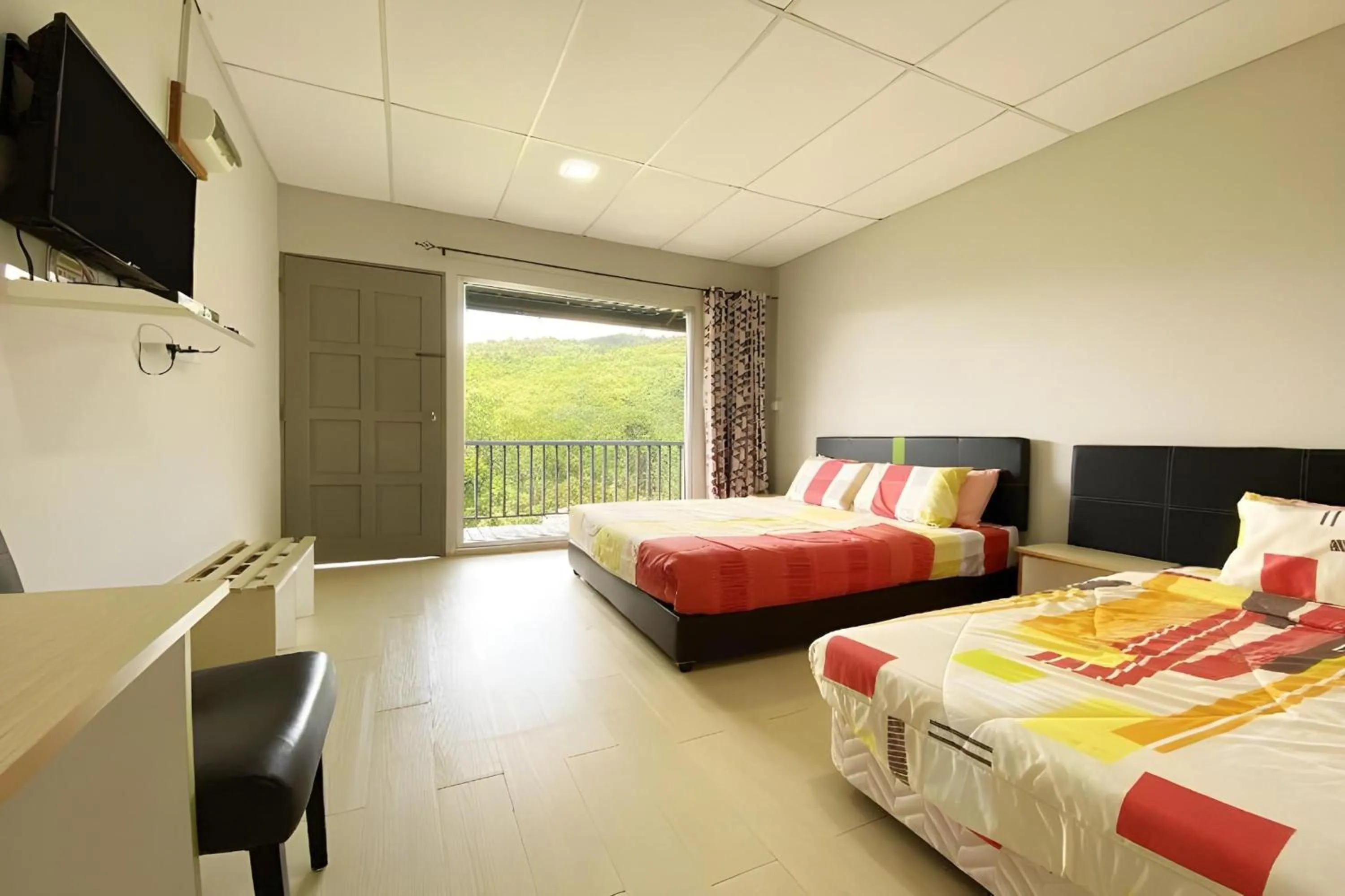 Photo of the whole room, Bed in Hotel O Tambunan Nature Lodge