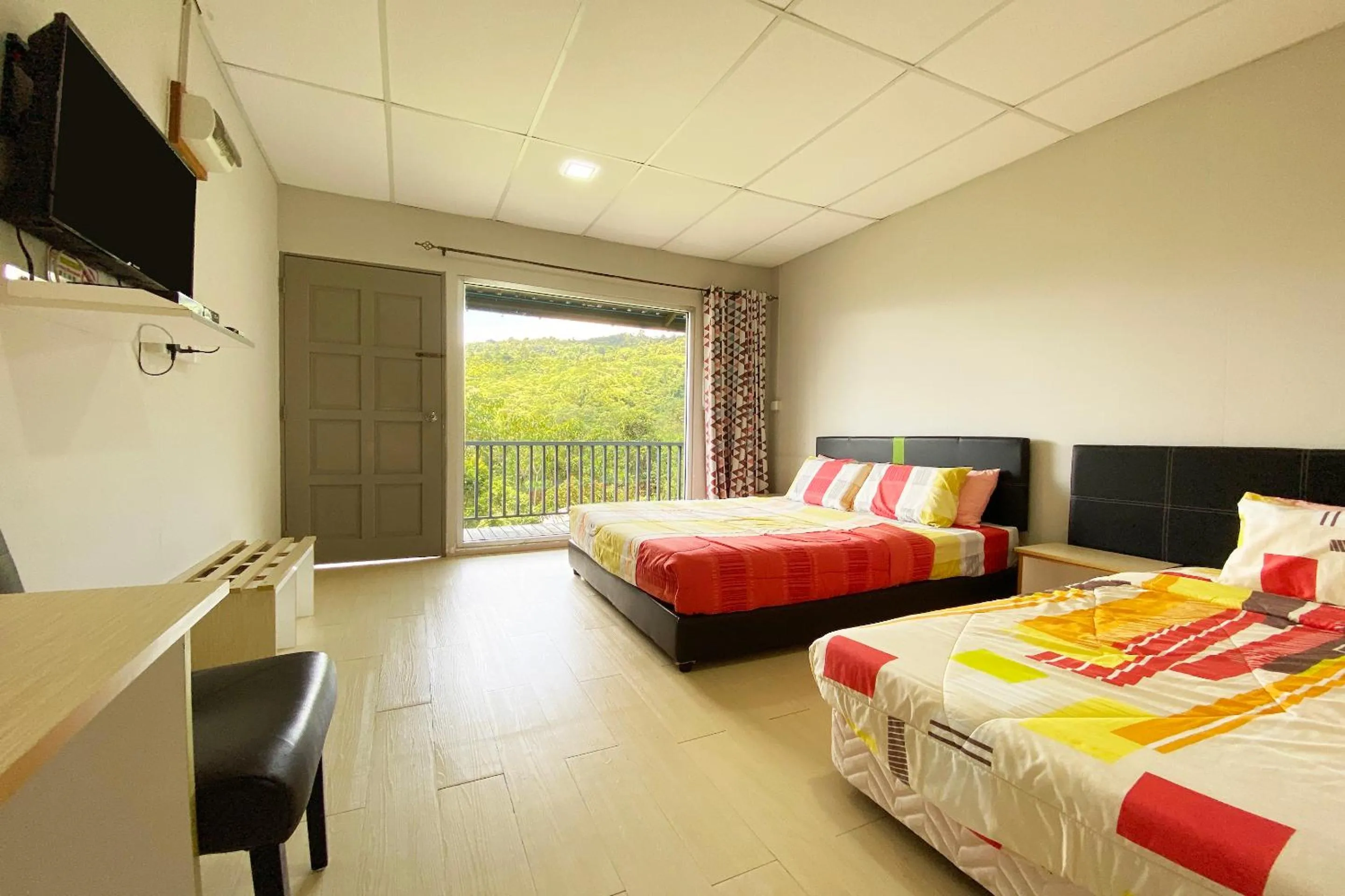 Photo of the whole room, Bed in Hotel O Tambunan Nature Lodge