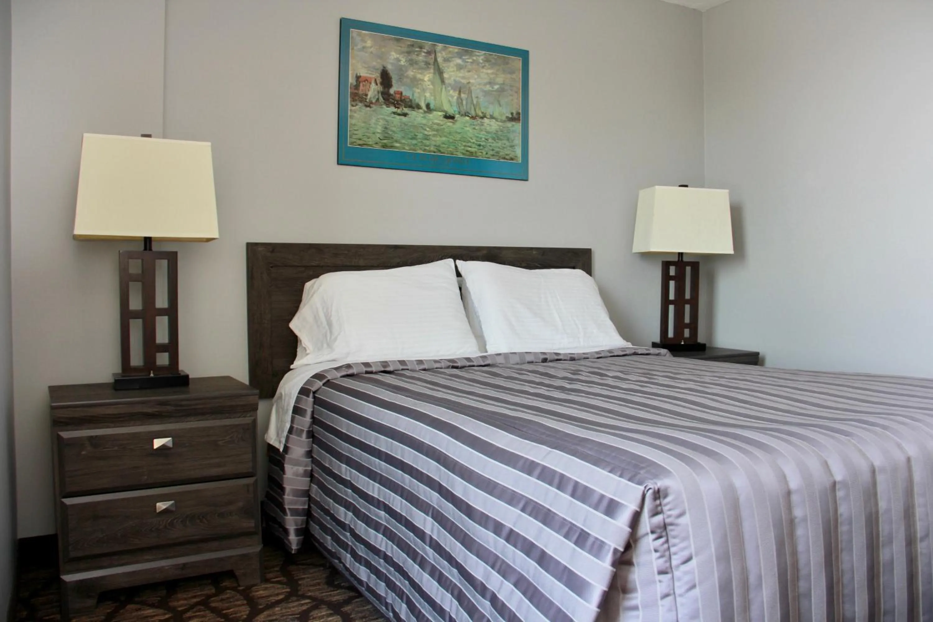 Bed in Victoria Motor Inn