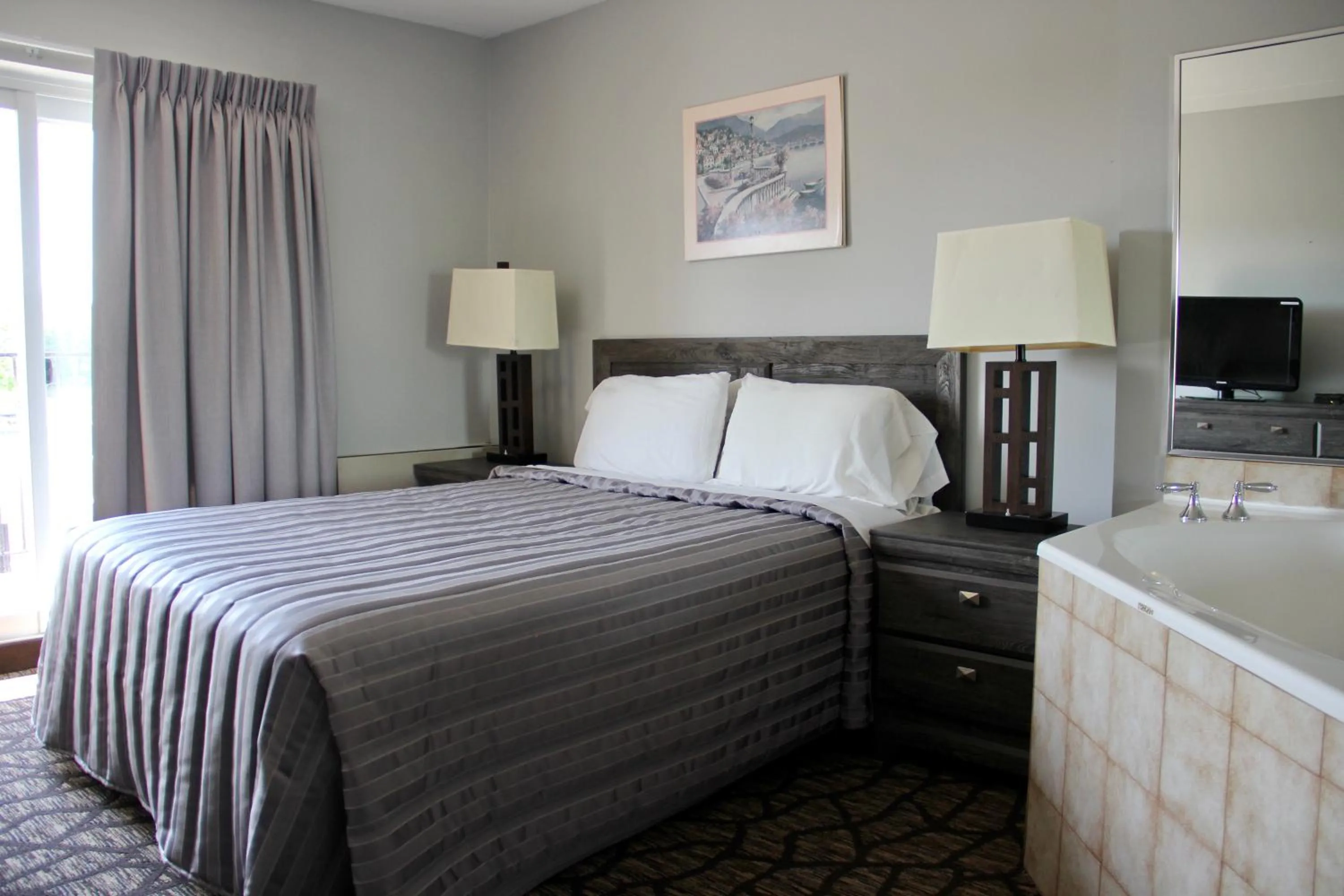 Bed in Victoria Motor Inn