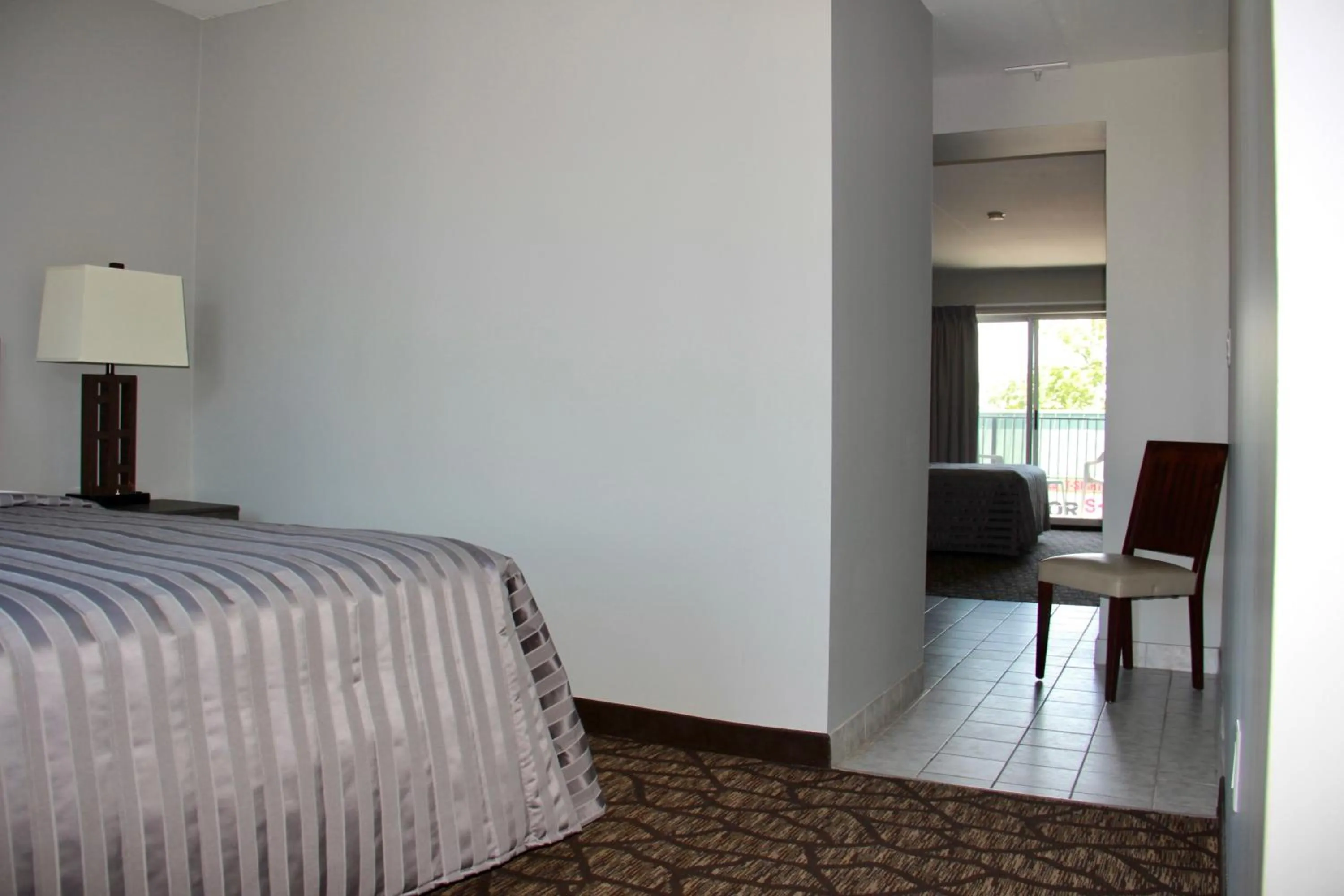 Bed in Victoria Motor Inn