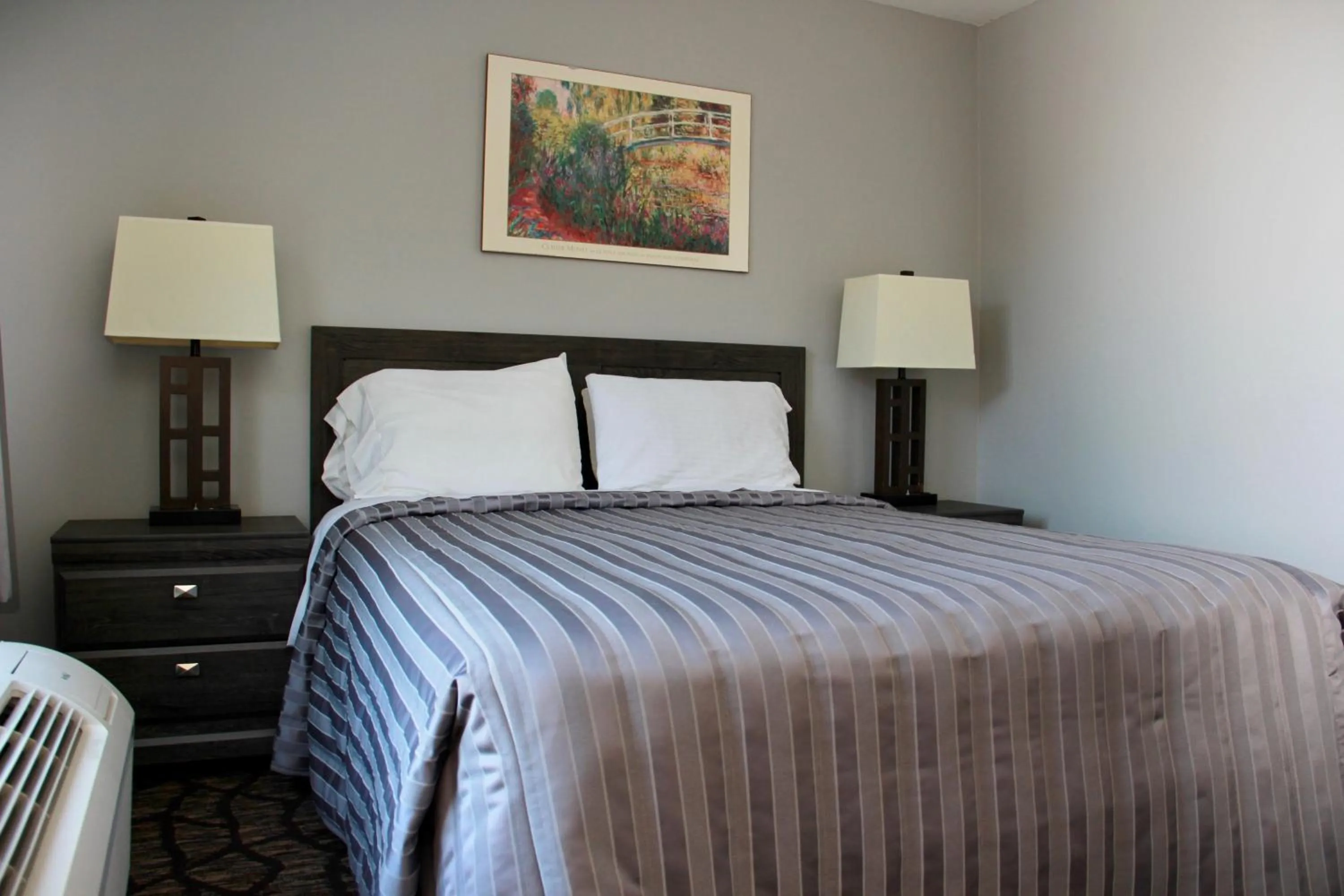 Bed in Victoria Motor Inn