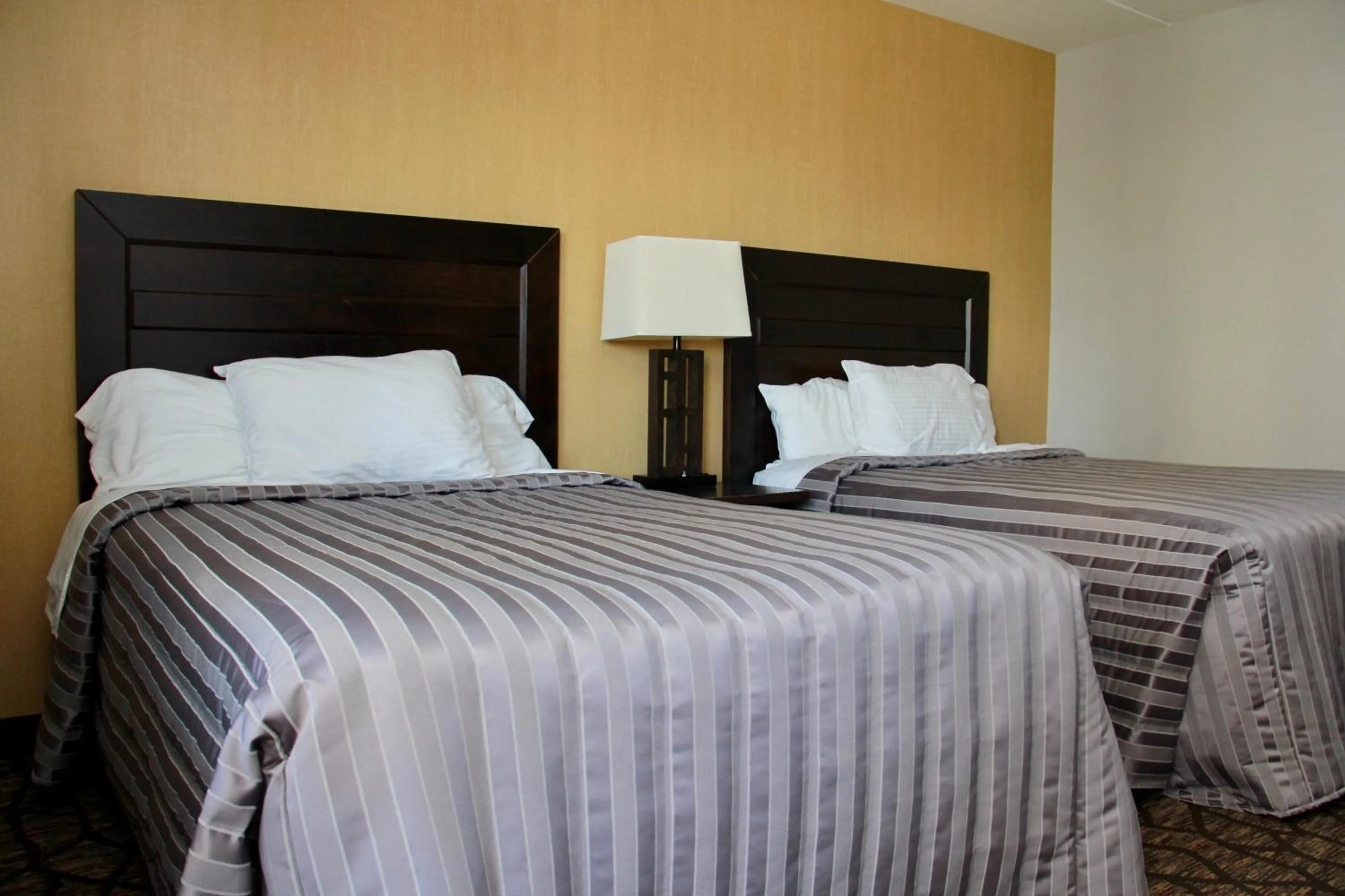 Bed in Victoria Motor Inn