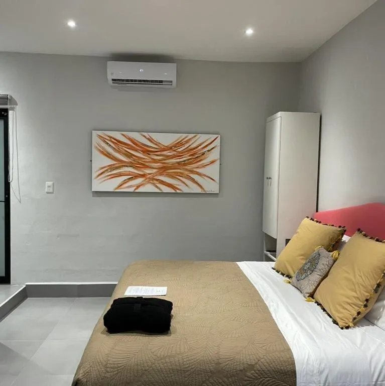 air conditioner, Bed in The Blue Eco Lodge