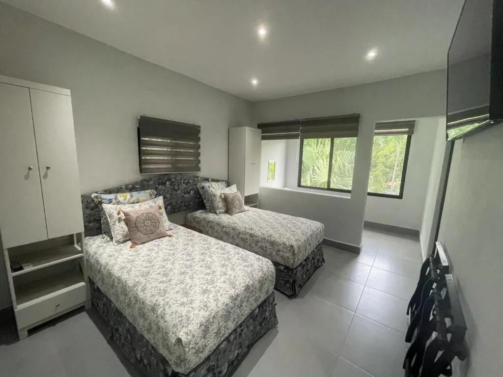 Bed in The Blue Eco Lodge