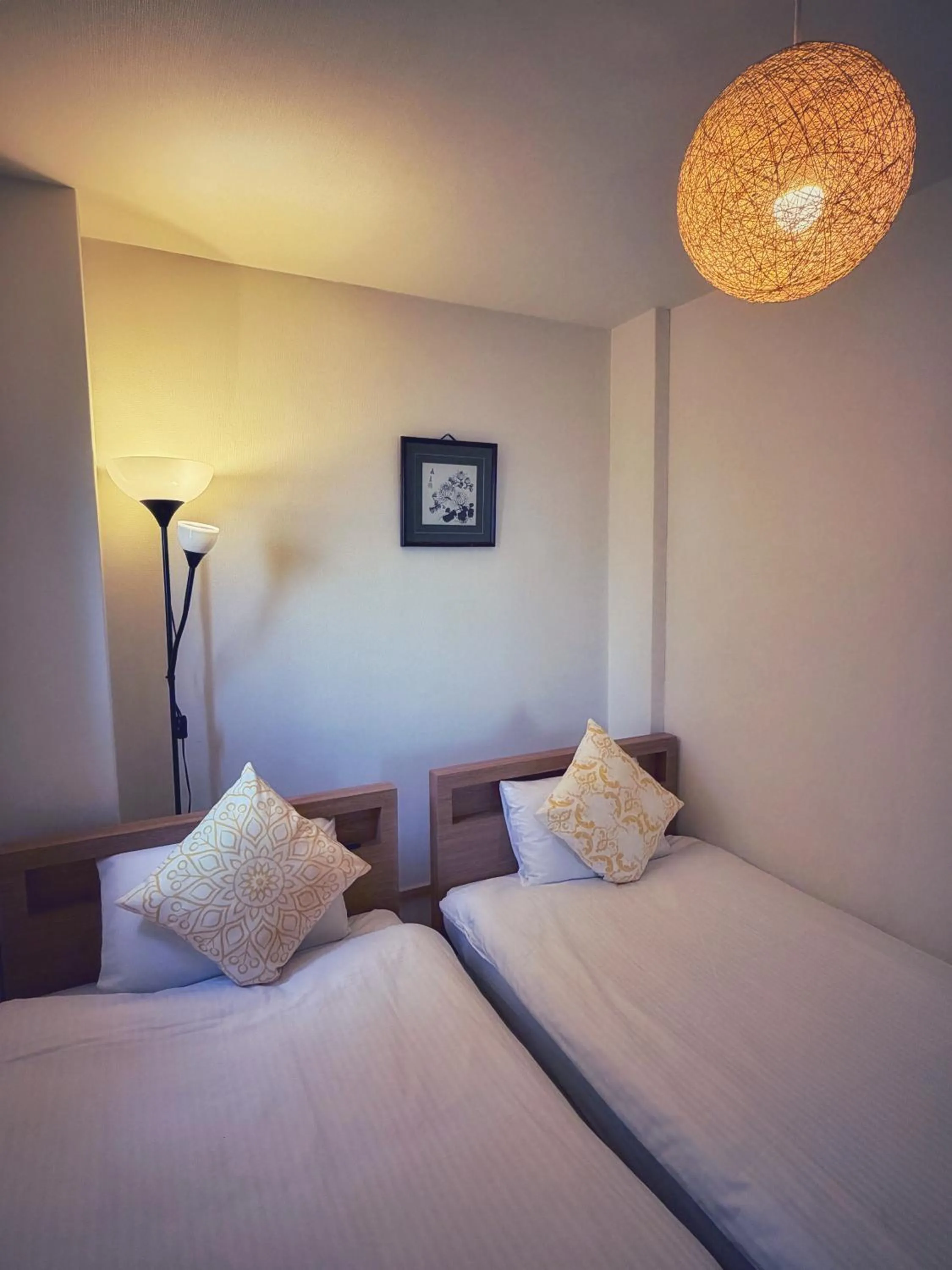 Bed in Uhome Ueno Hotel