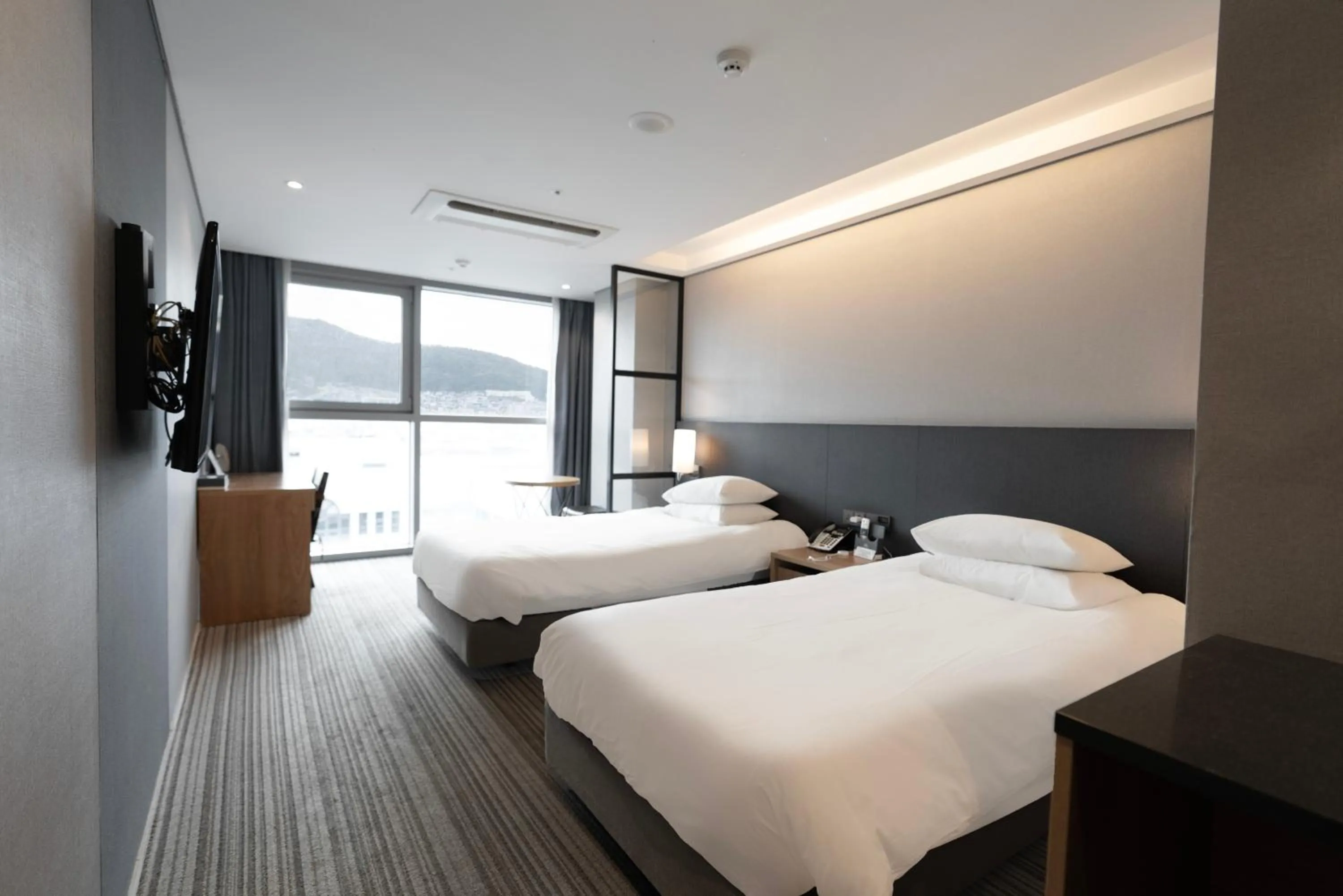 Bed in Northharbor Hotel