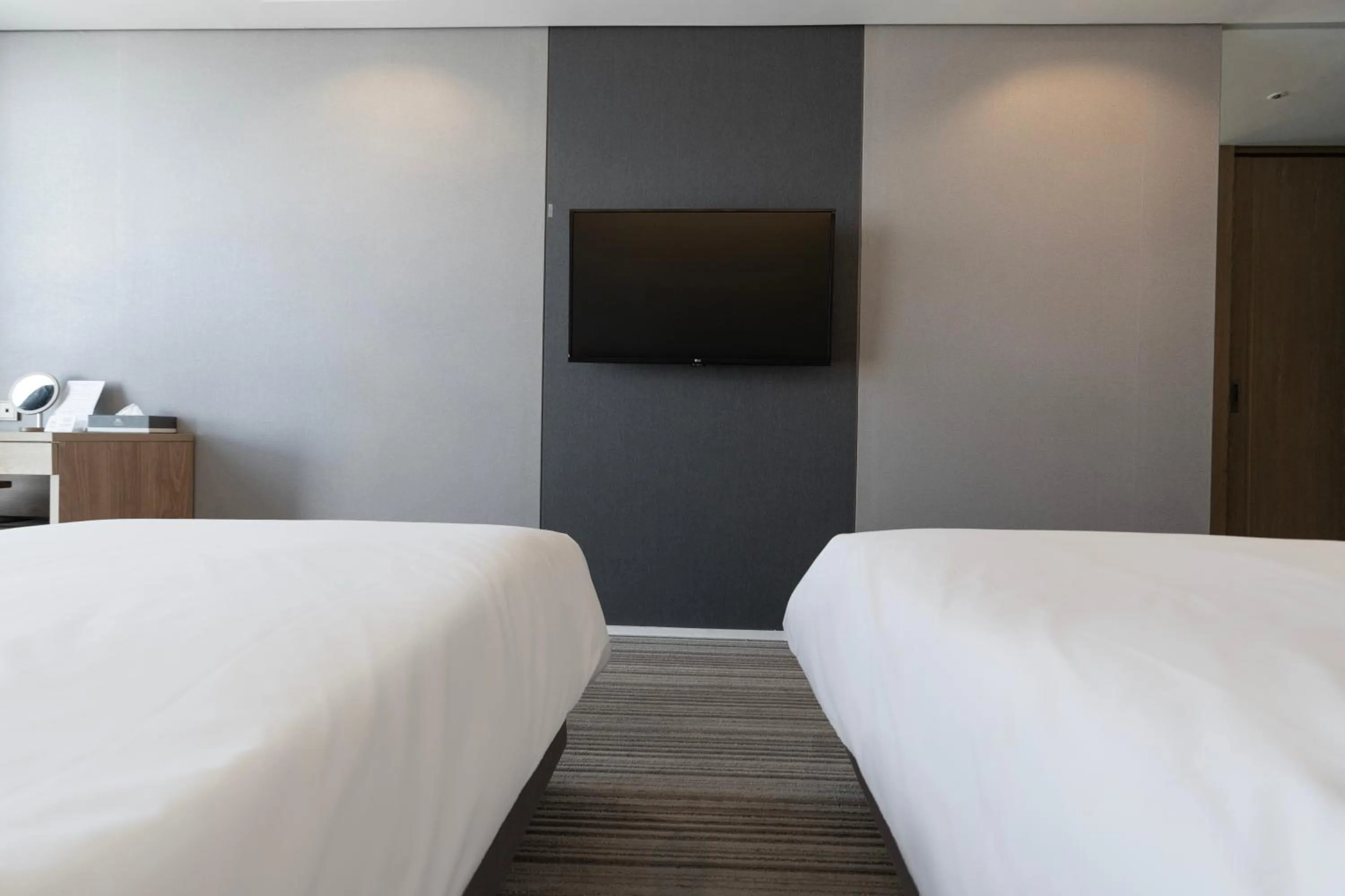 Bed in Northharbor Hotel