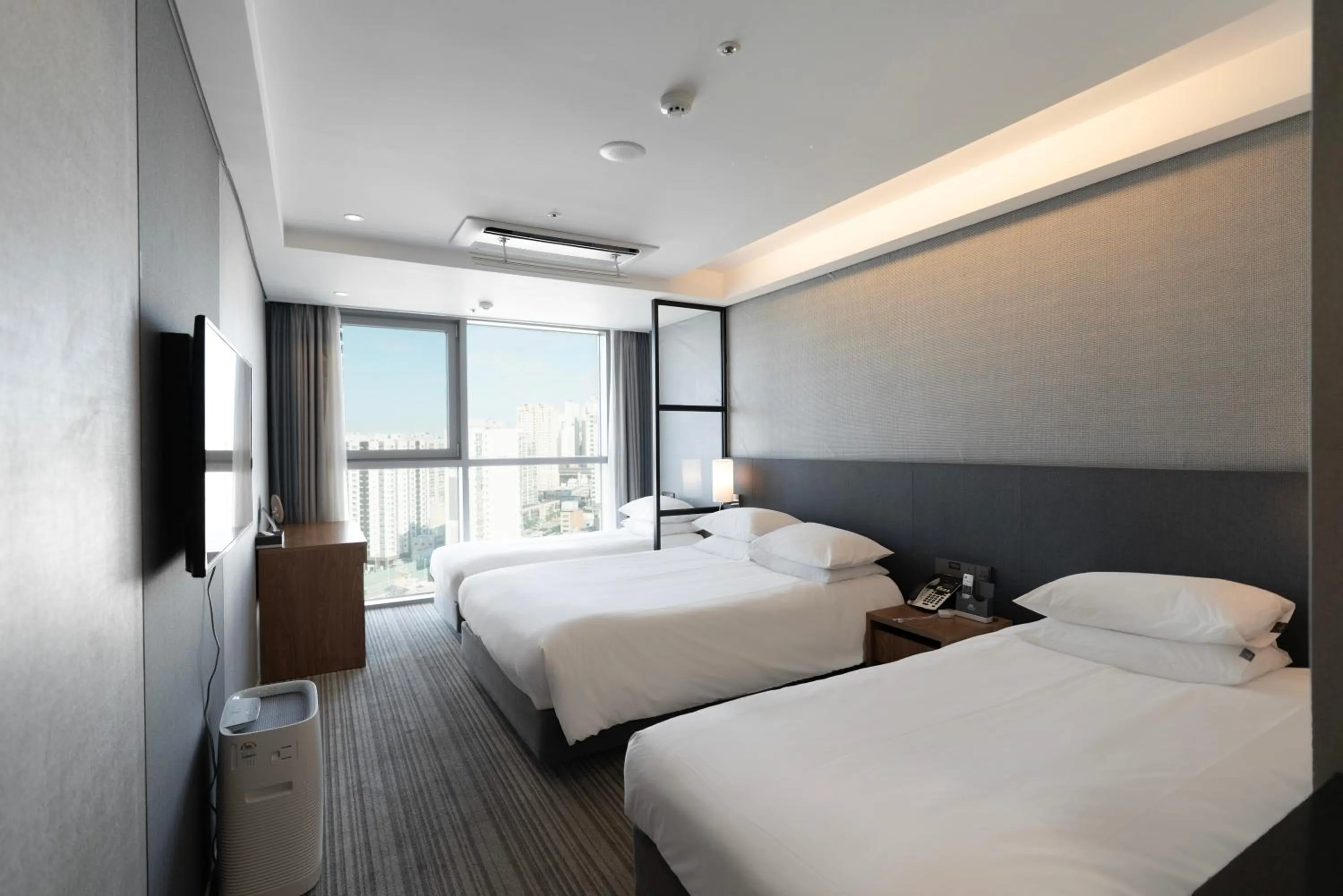 Bed in Northharbor Hotel