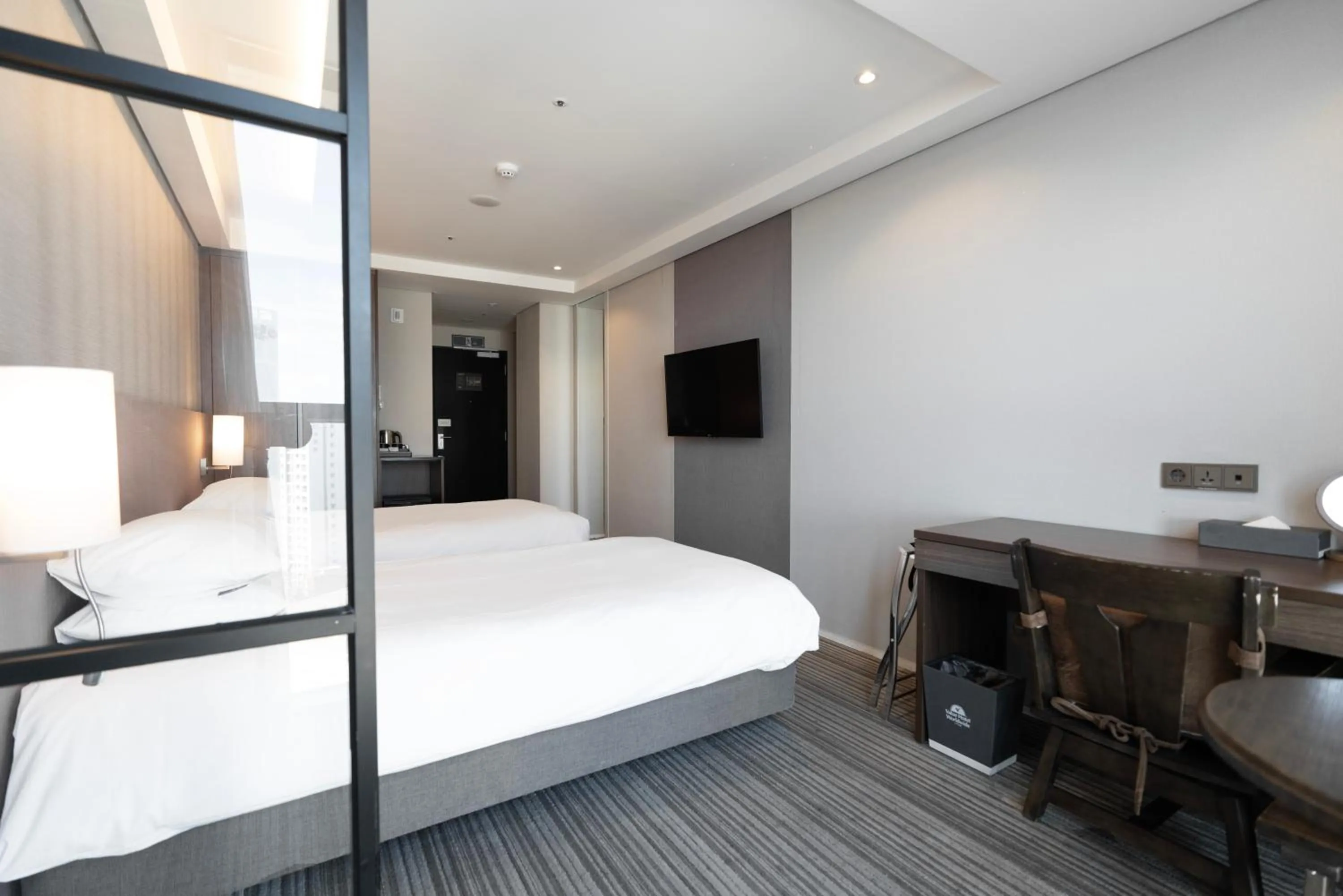 Bed in Northharbor Hotel