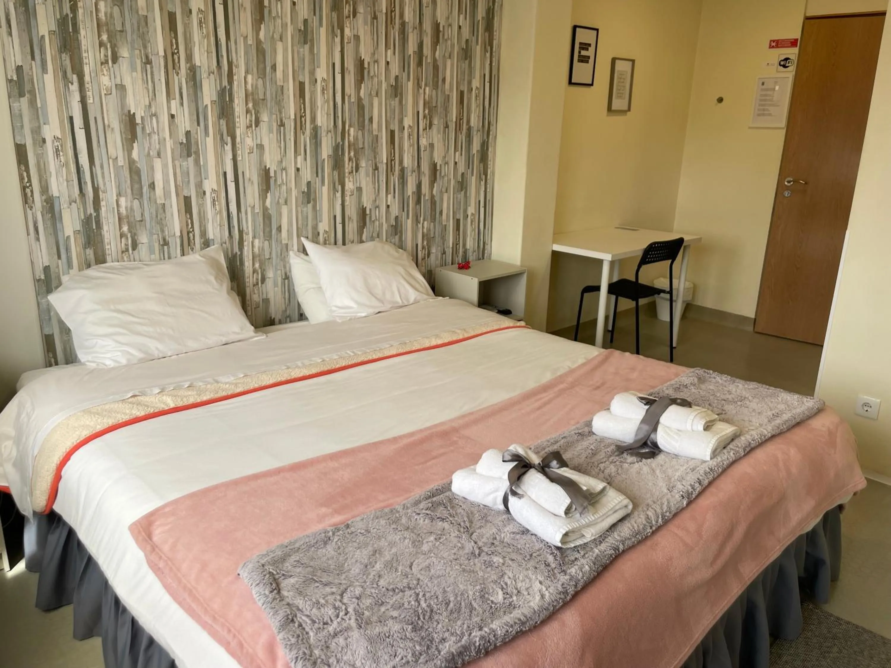 Bed in Liber Guest House