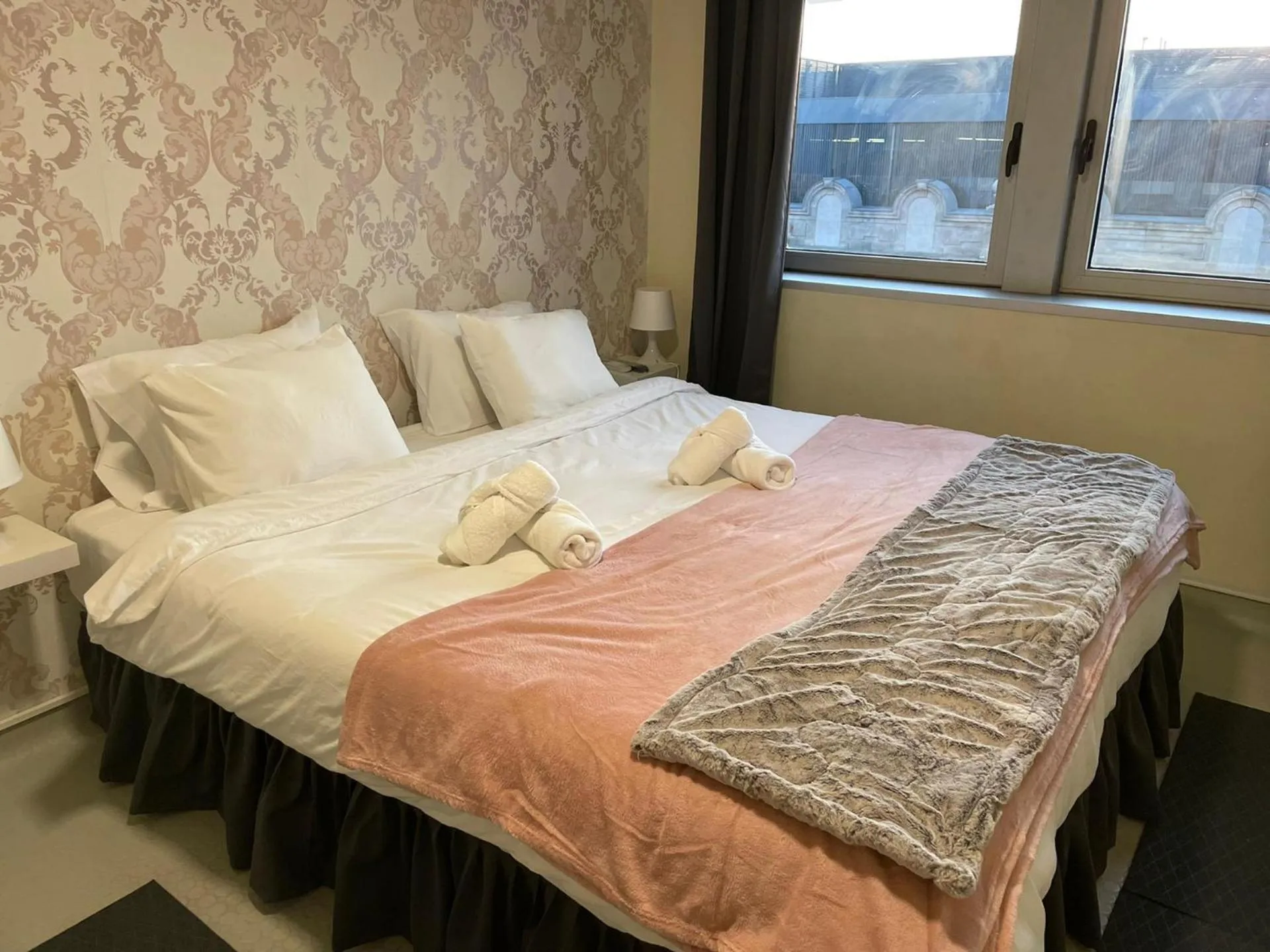 Bed in Liber Guest House