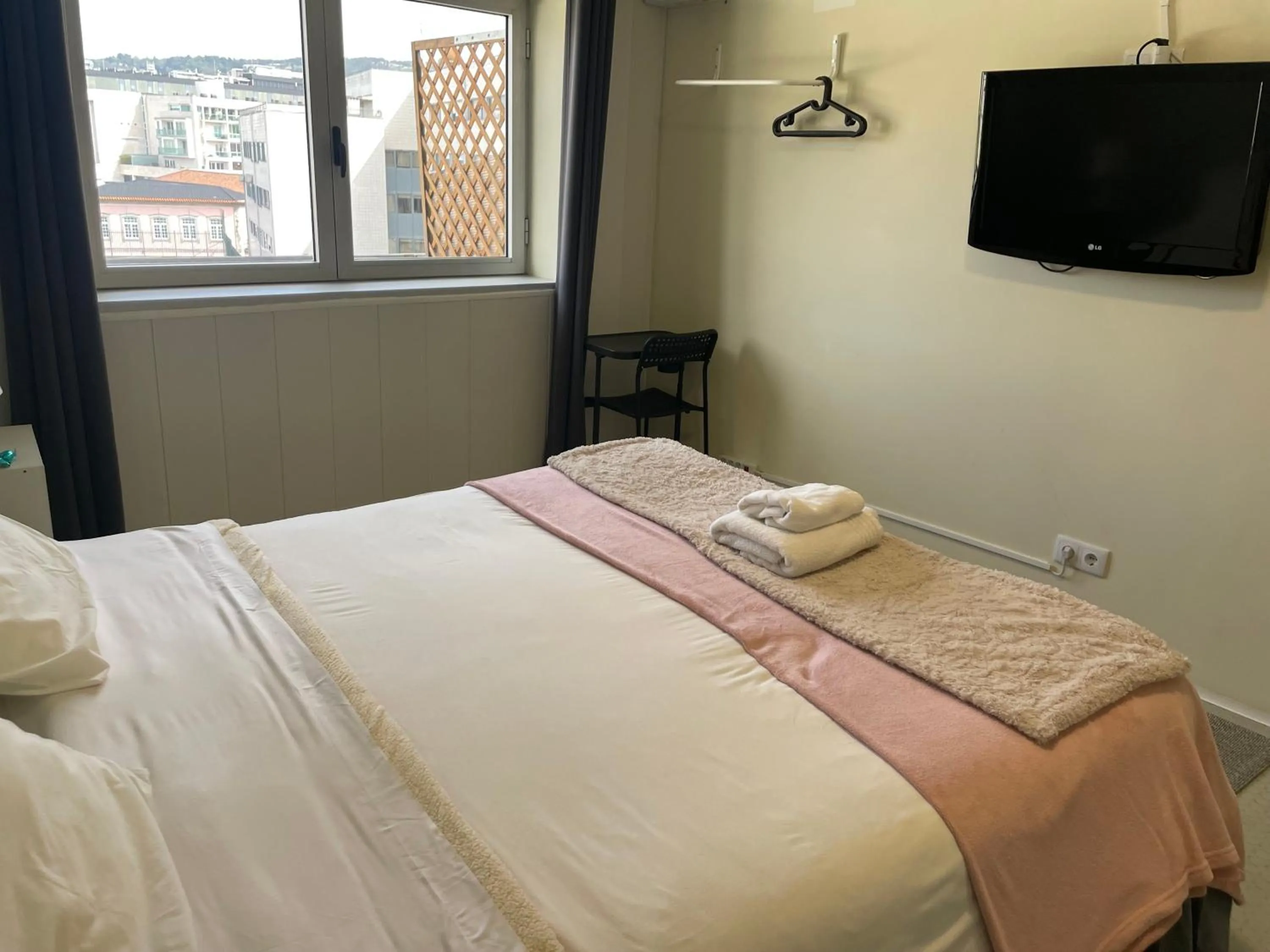 Bed in Liber Guest House