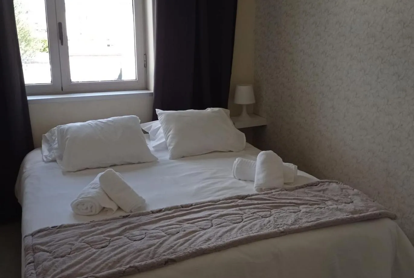 Bed in Liber Guest House