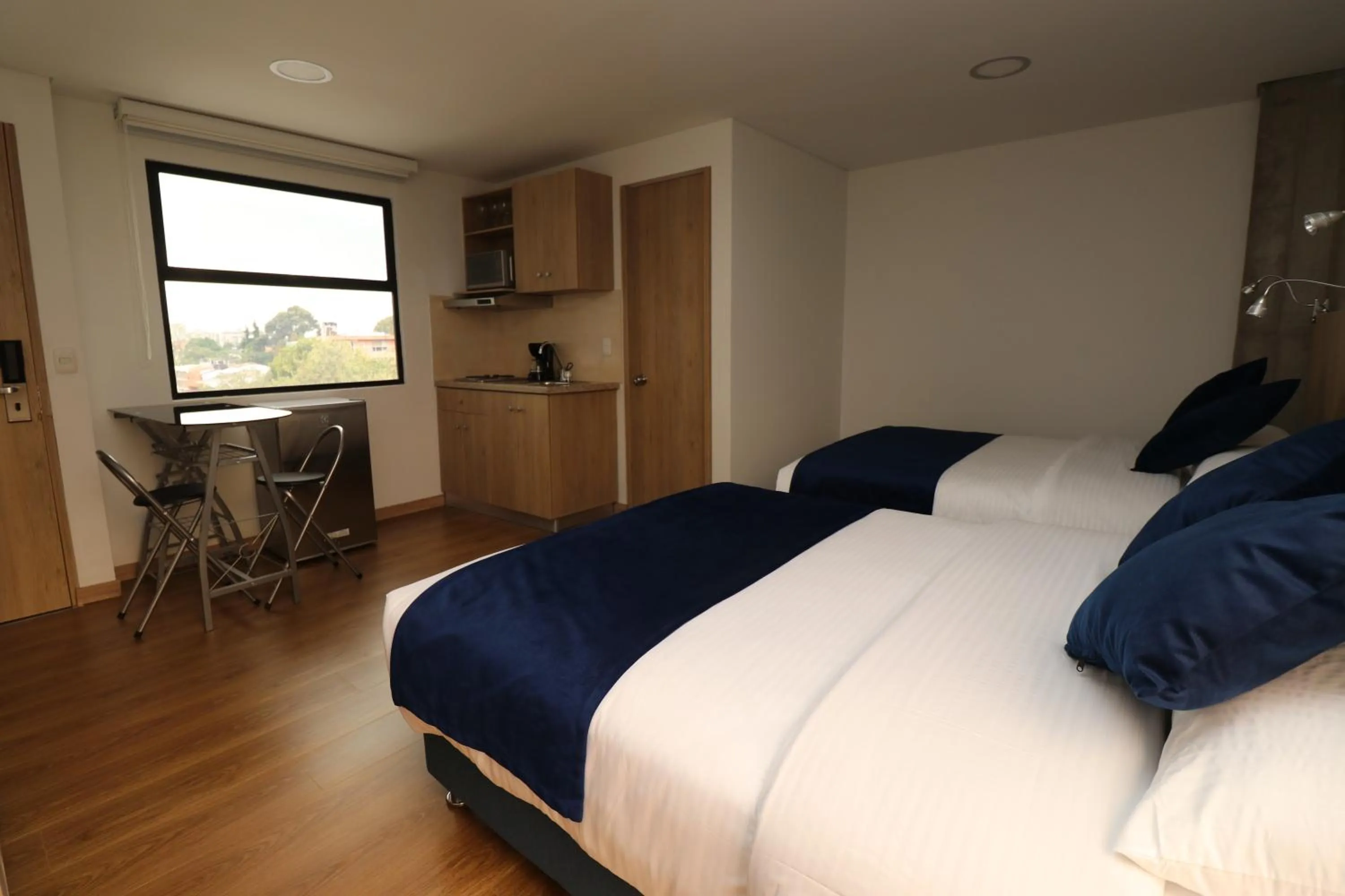 Coffee/tea facilities, Bed in Normandía Tower