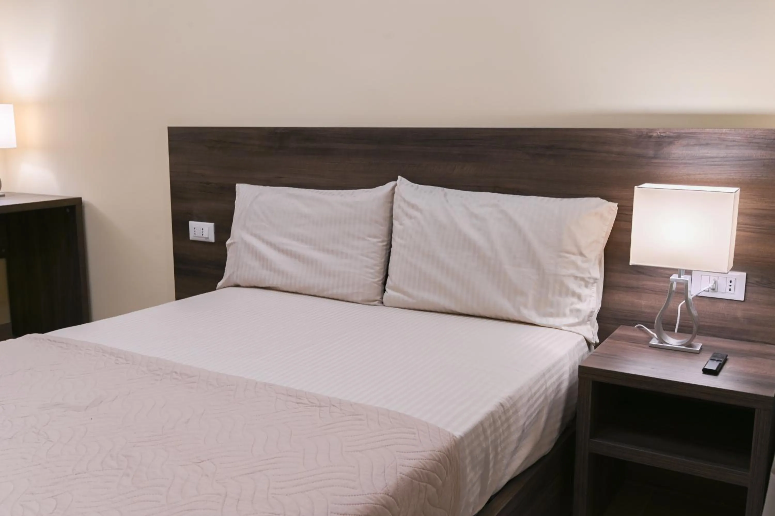 Bed in ADRIA Luxury Residence - Centro Trieste