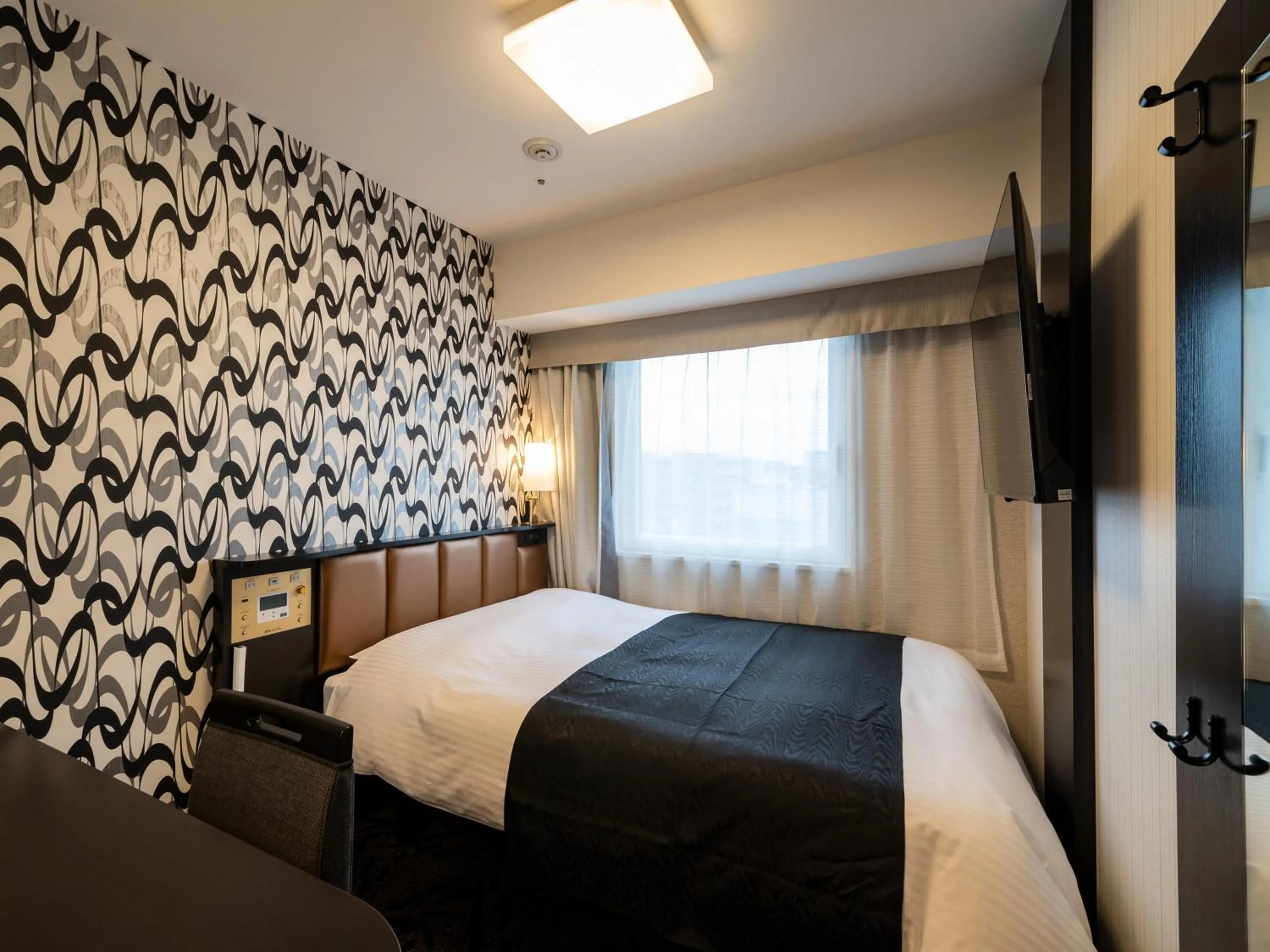 Photo of the whole room, Bed in APA Hotel Akihabara Ekihigashi