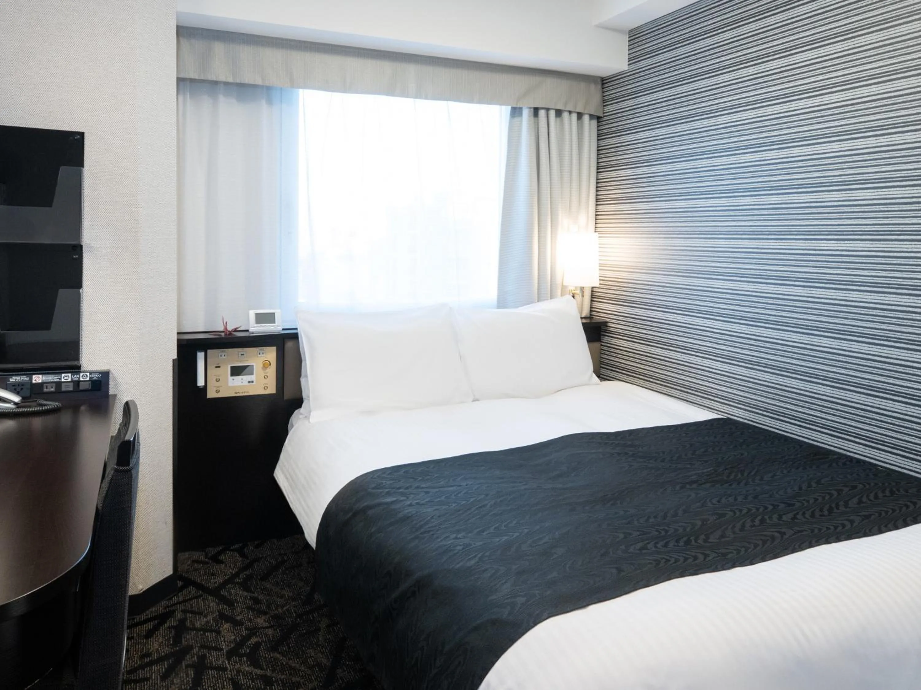 Photo of the whole room, Bed in APA Hotel Akihabara Ekihigashi
