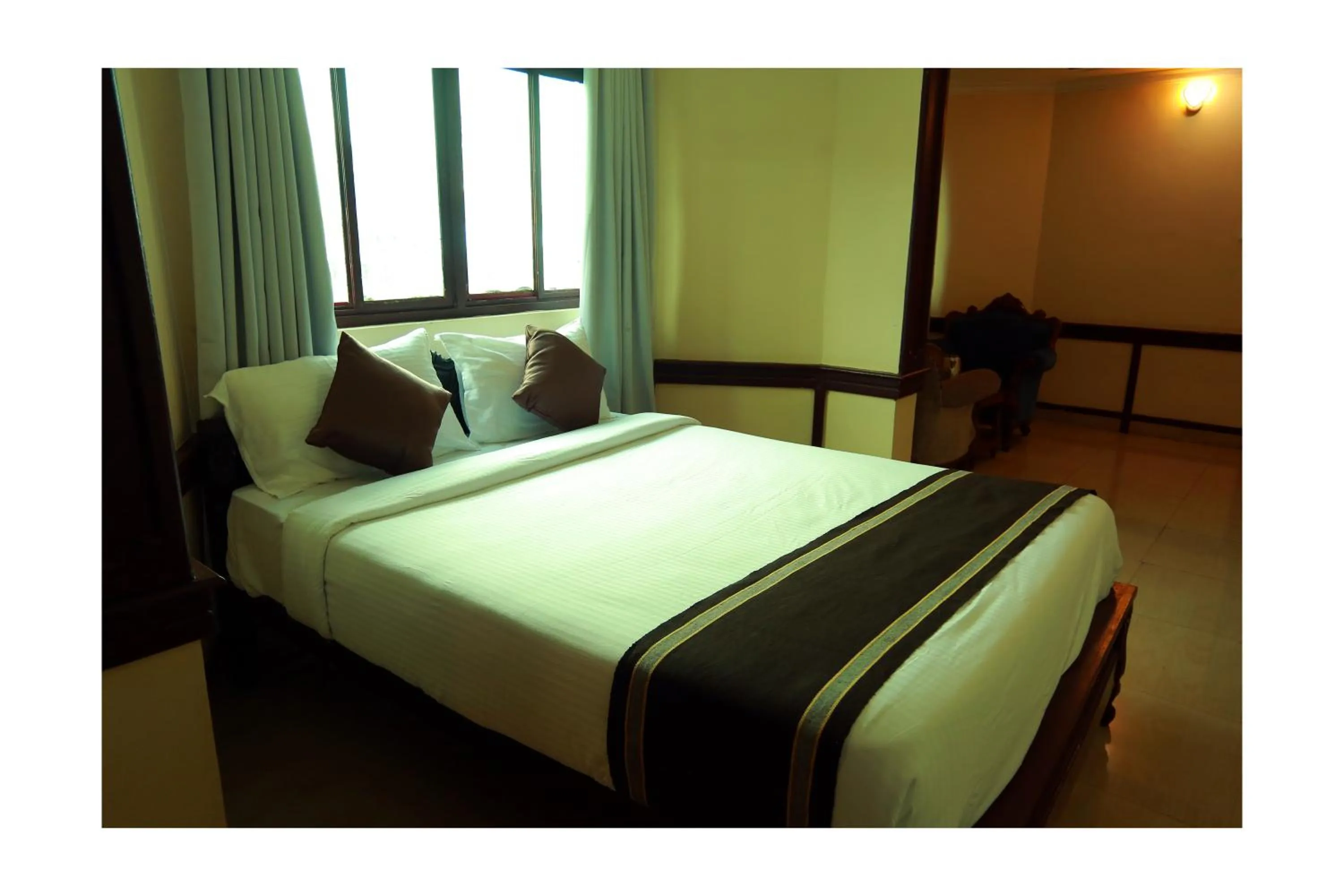 Bedroom in CORRIDOR CALICUT Airport Hotel