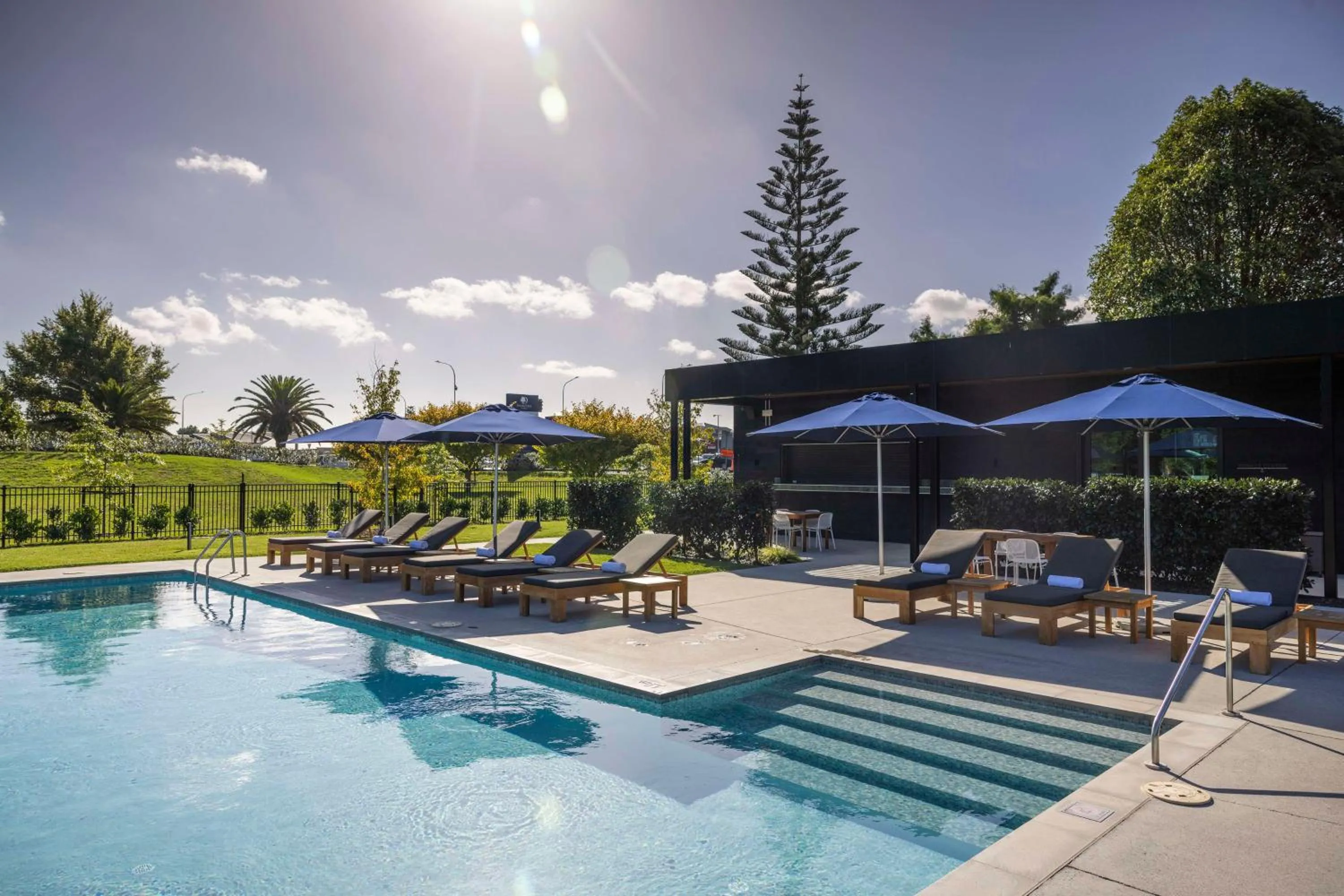 Pool view in DoubleTree By Hilton Auckland Karaka