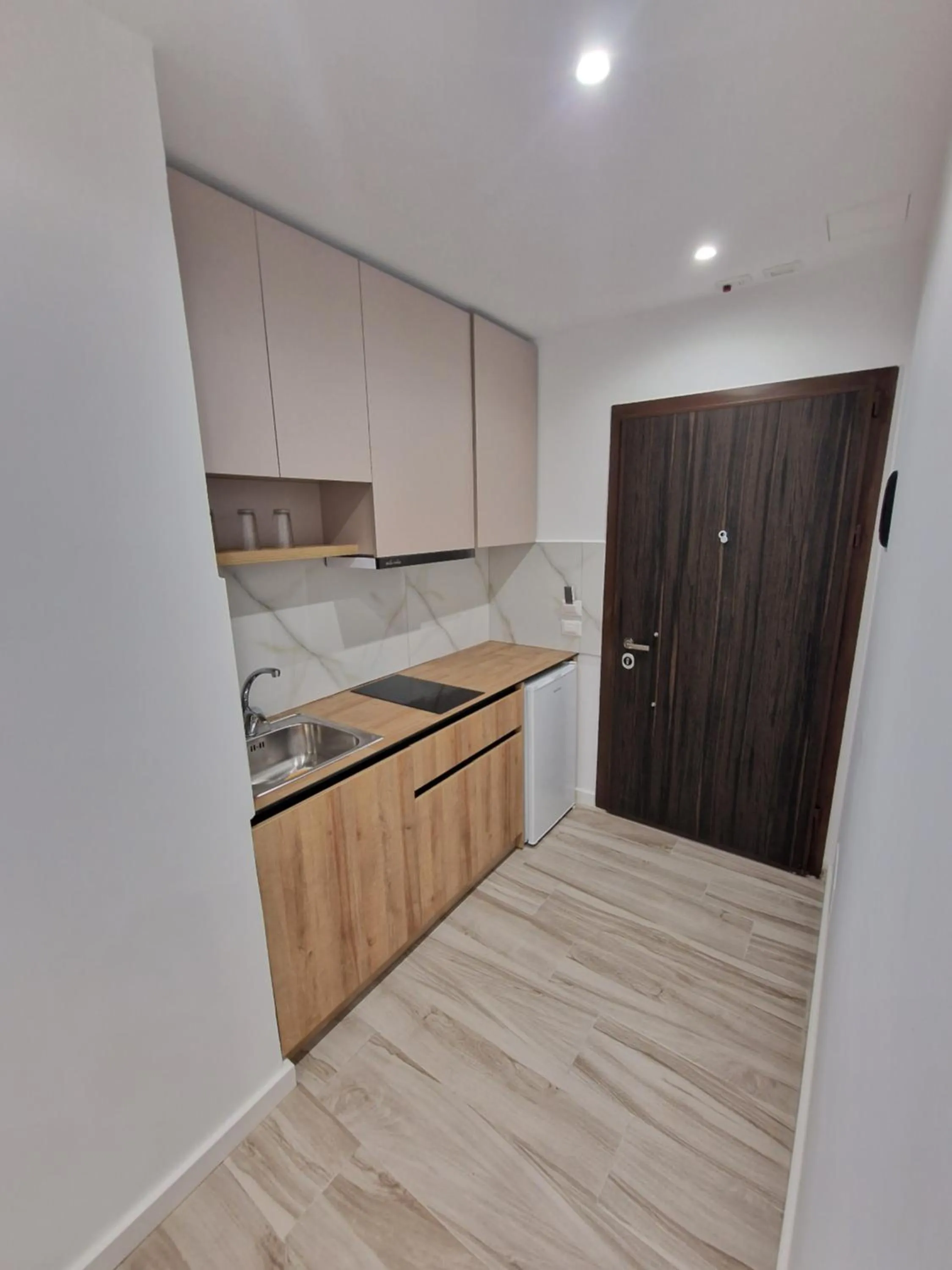 Kitchen or kitchenette in Joanna Suites