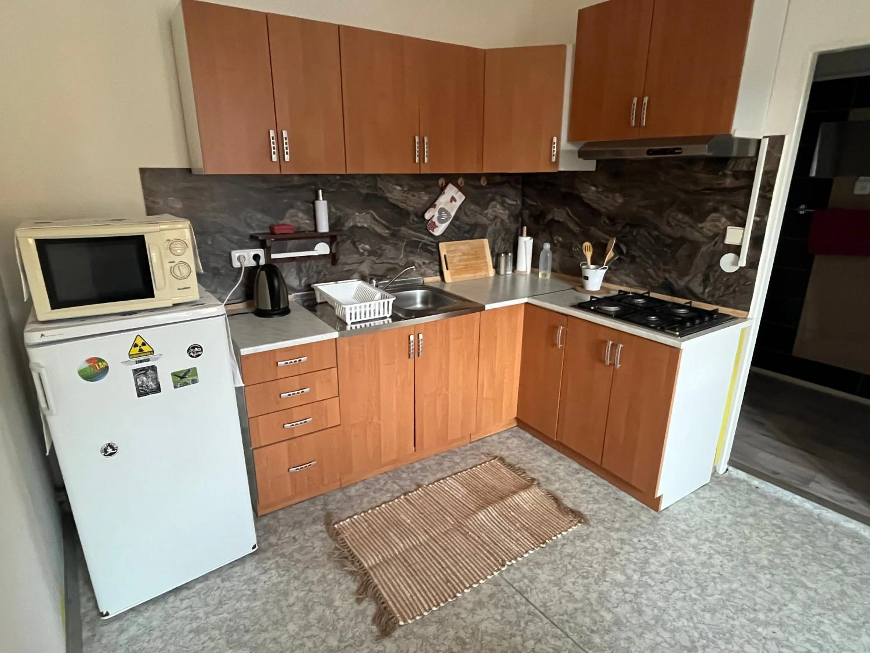 Kitchen or kitchenette in H@M Penzion