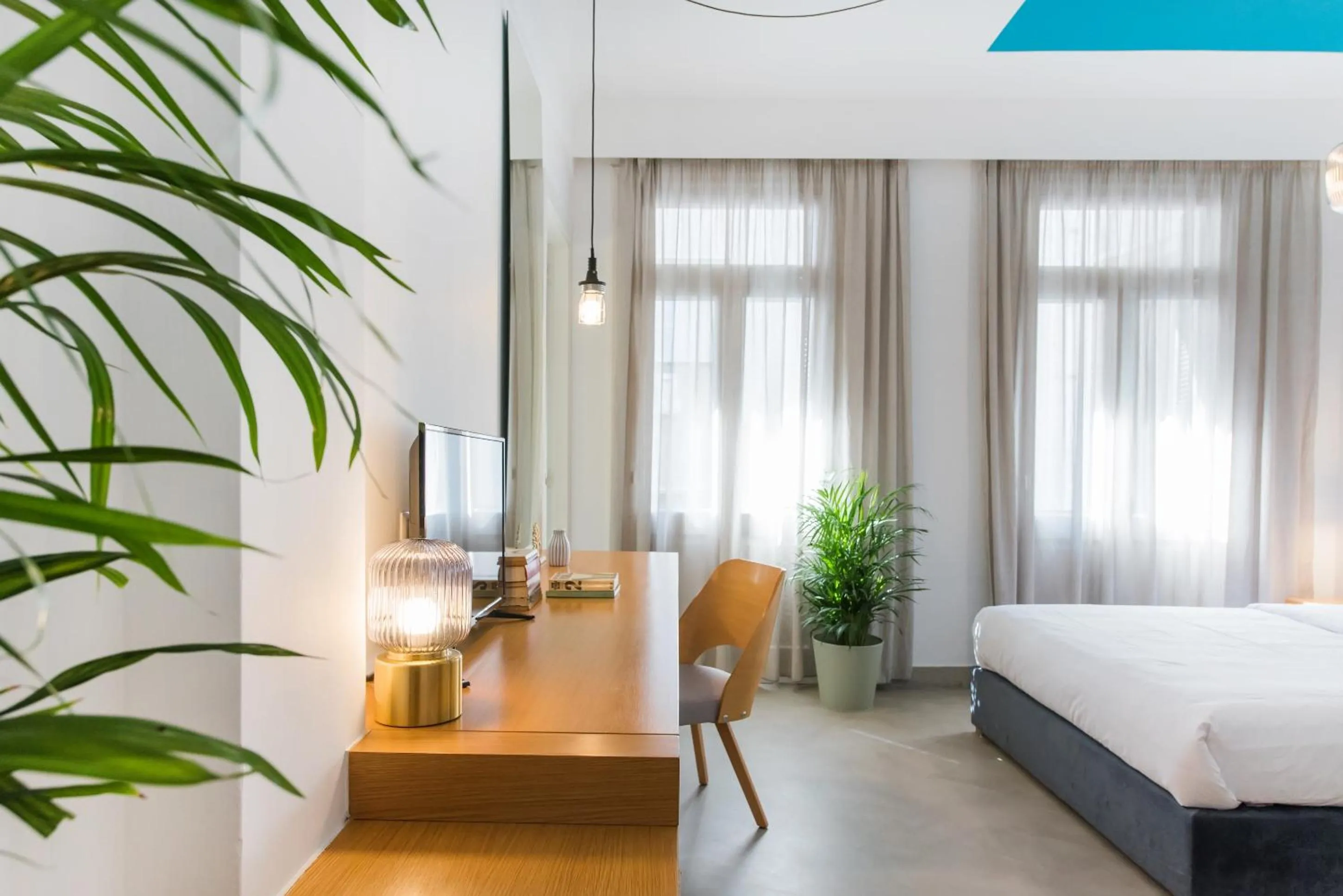 Seating area, Bed in MONK Monastiraki Suites